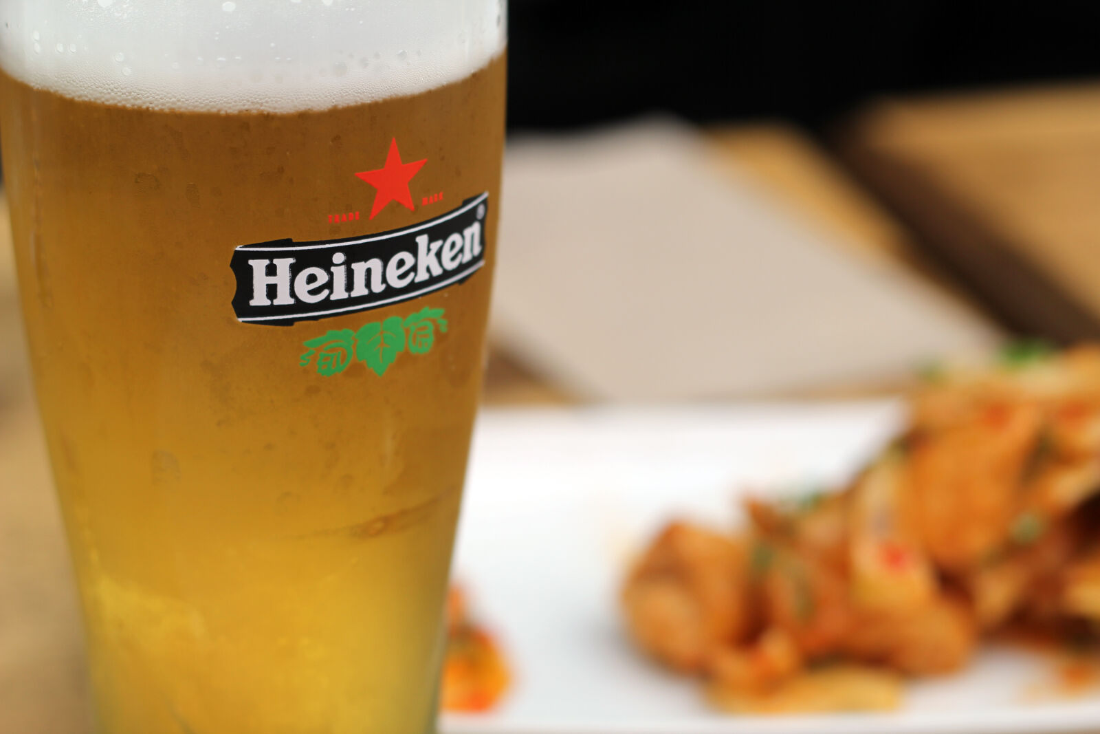 Canon EOS 60D + Canon EF 50mm F1.8 II sample photo. Filled, heineken, pilsner, glass photography