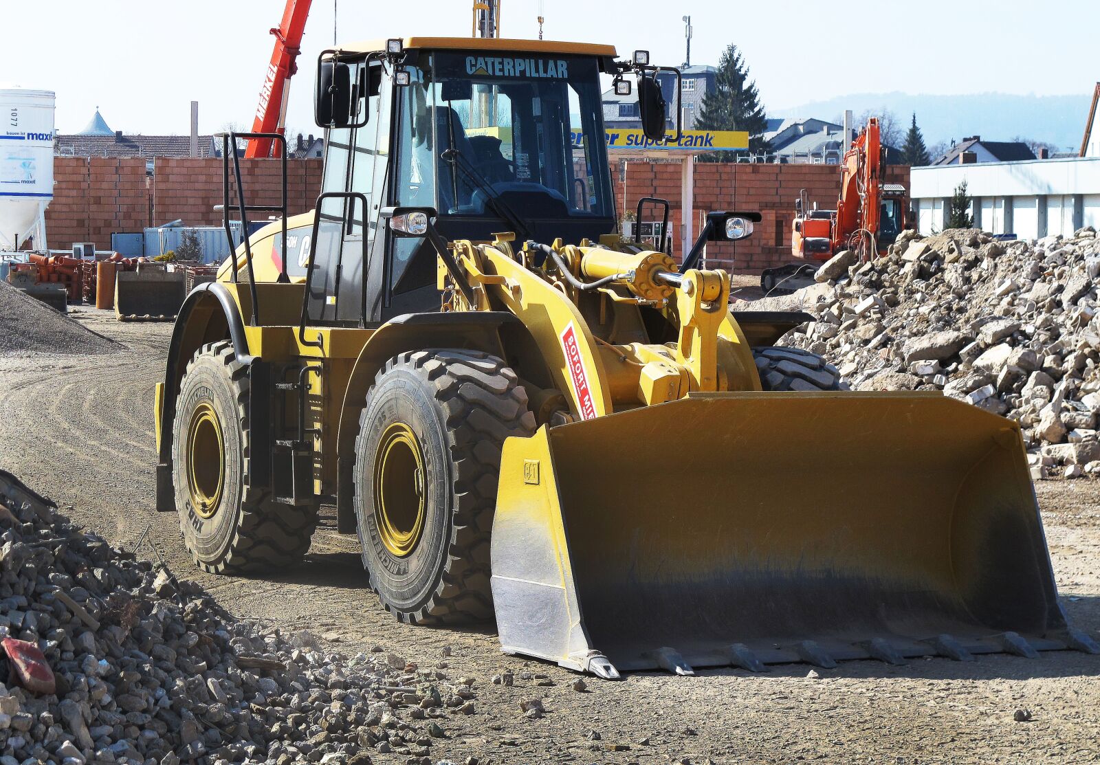 Canon PowerShot G12 sample photo. Wheel loader, building rubble photography