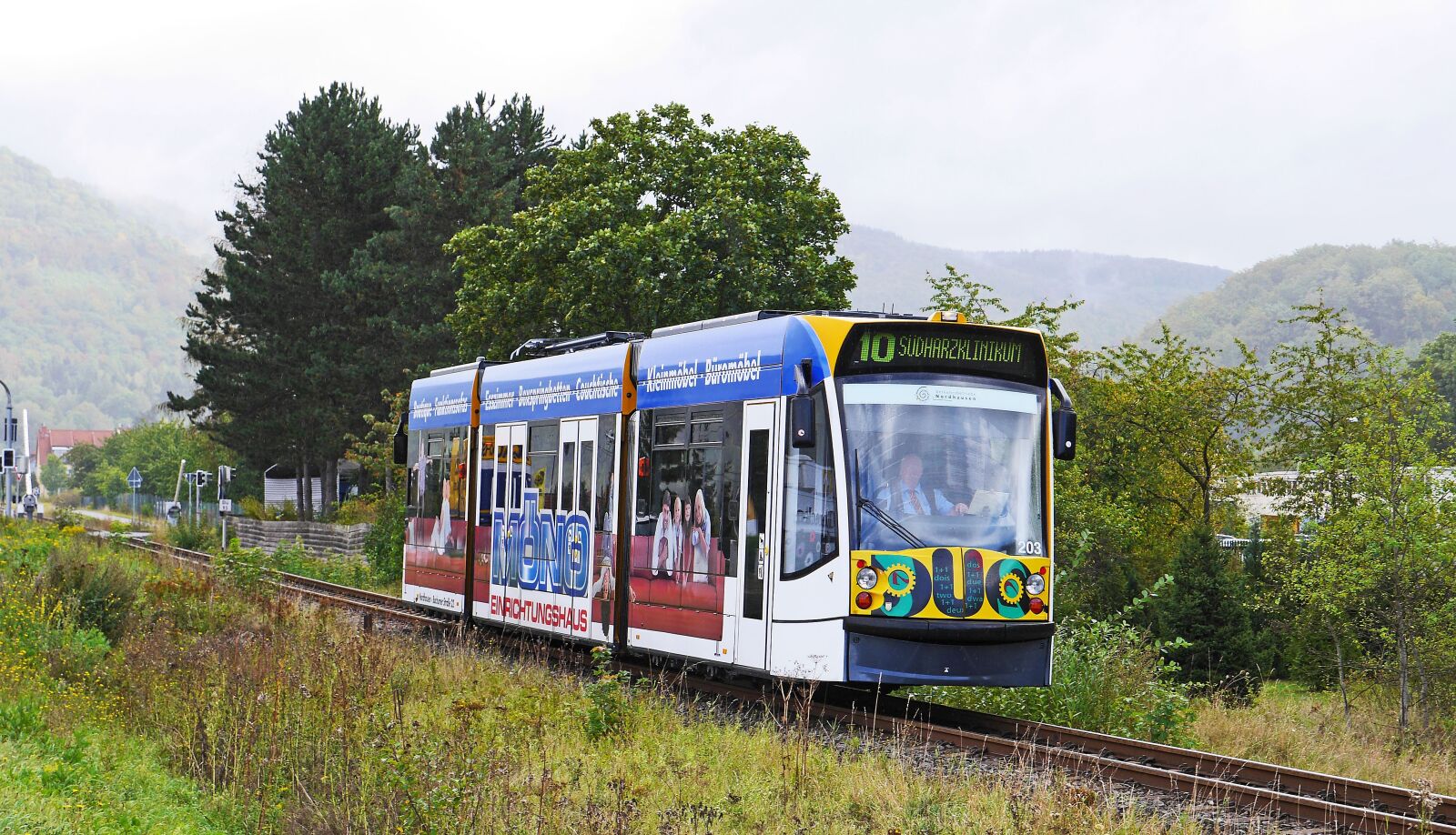 Panasonic Lumix DMC-GH3 sample photo. Tram, hybrid, battery photography