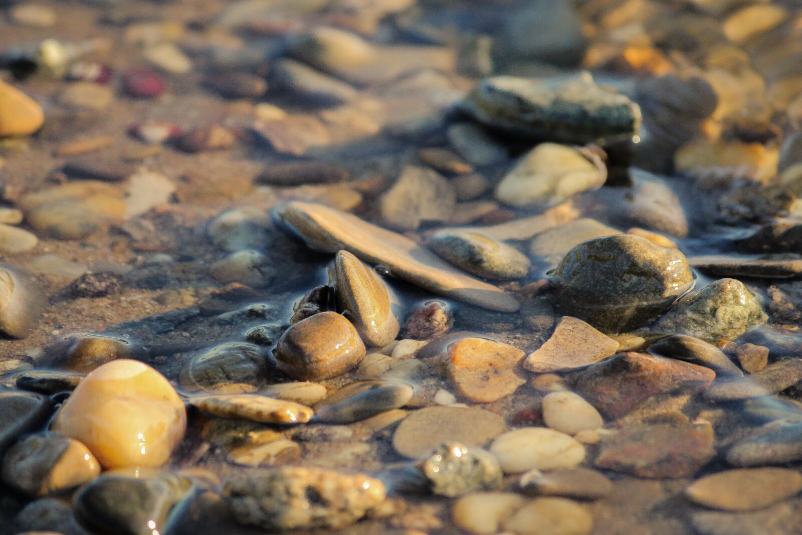 Canon EF-S 55-250mm F4-5.6 IS II sample photo. Stones, bach, water photography