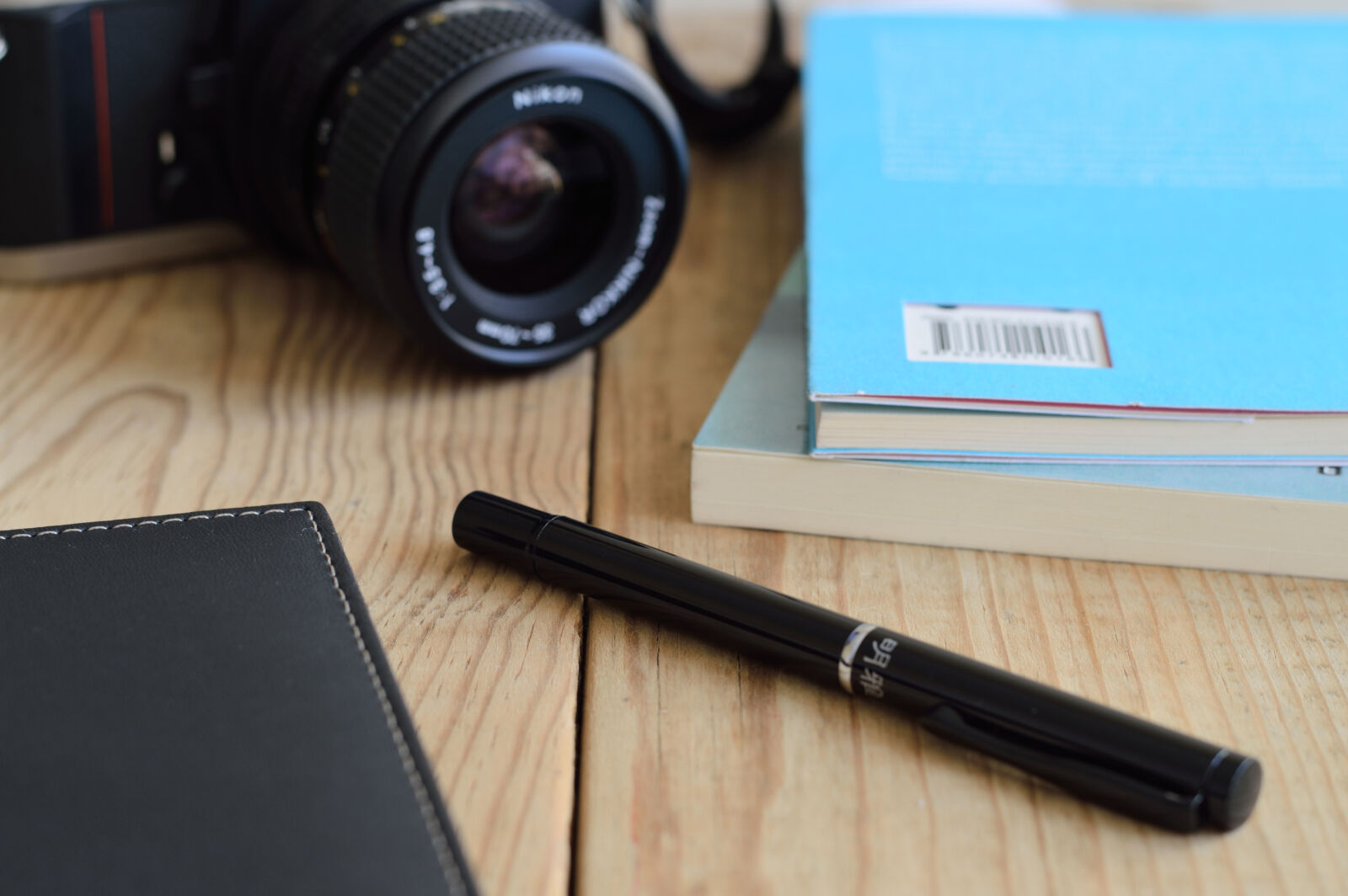 Nikon D3200 sample photo. Book, camera, depth, of photography