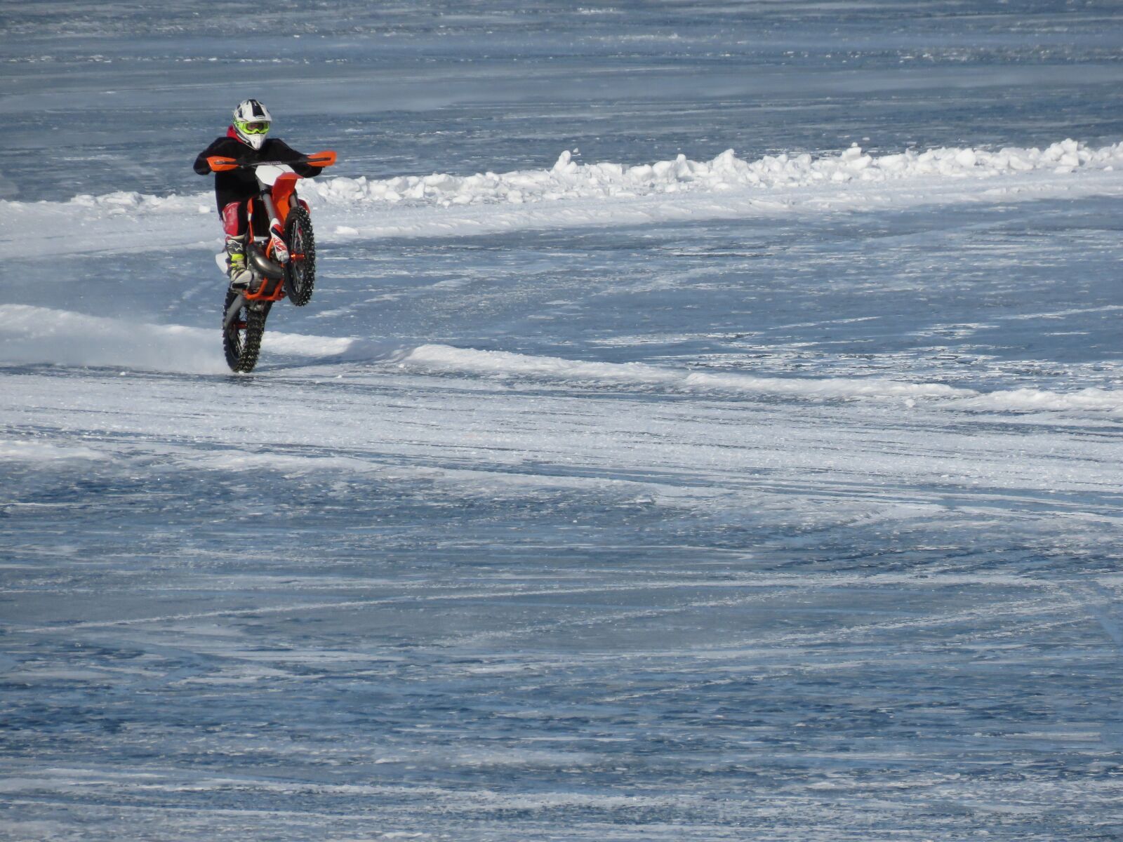 Canon PowerShot SX60 HS sample photo. Motorcycle, wheelie, stunt photography