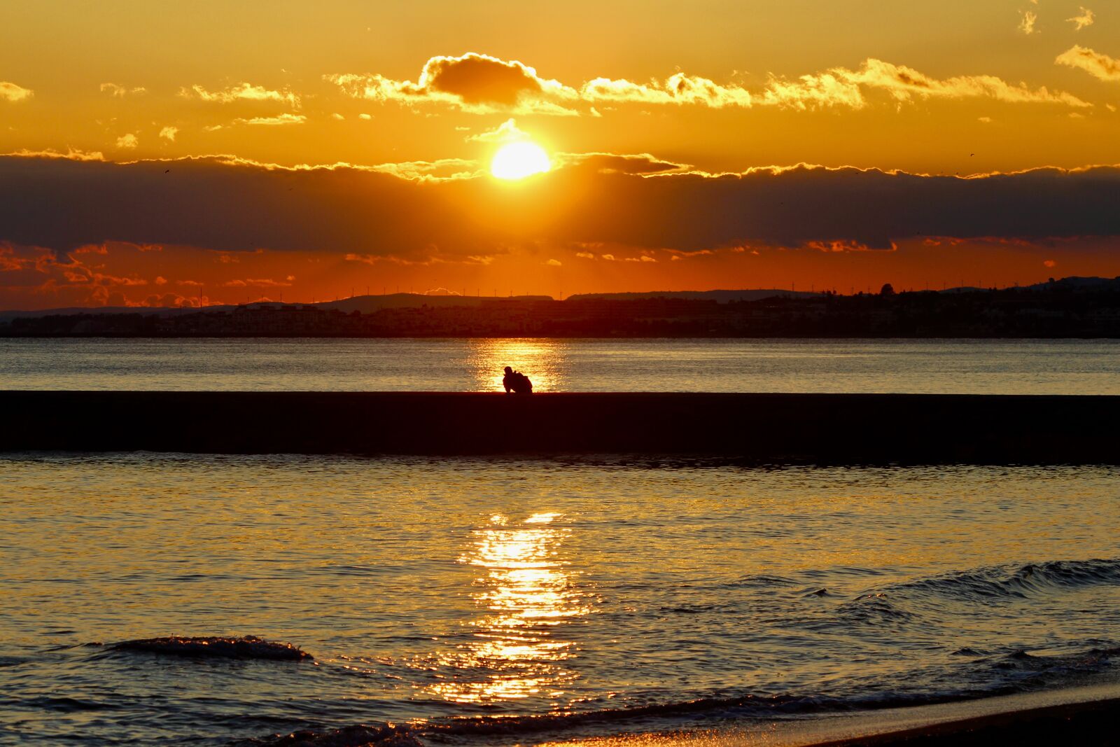 Canon EF 70-300mm F4-5.6 IS USM sample photo. Man, sunset, fantastic photography