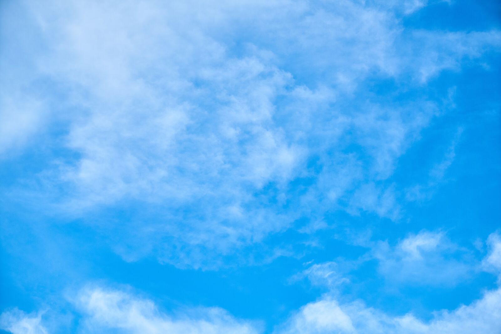 Sony a7R II sample photo. Blue, clouds, white photography