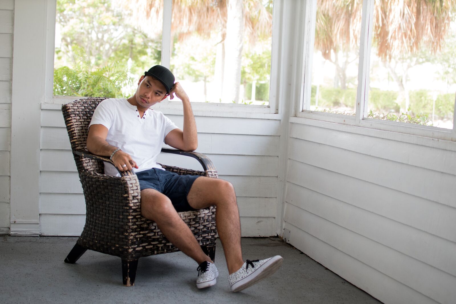 Nikon D5500 sample photo. Man, asian, rocking chair photography