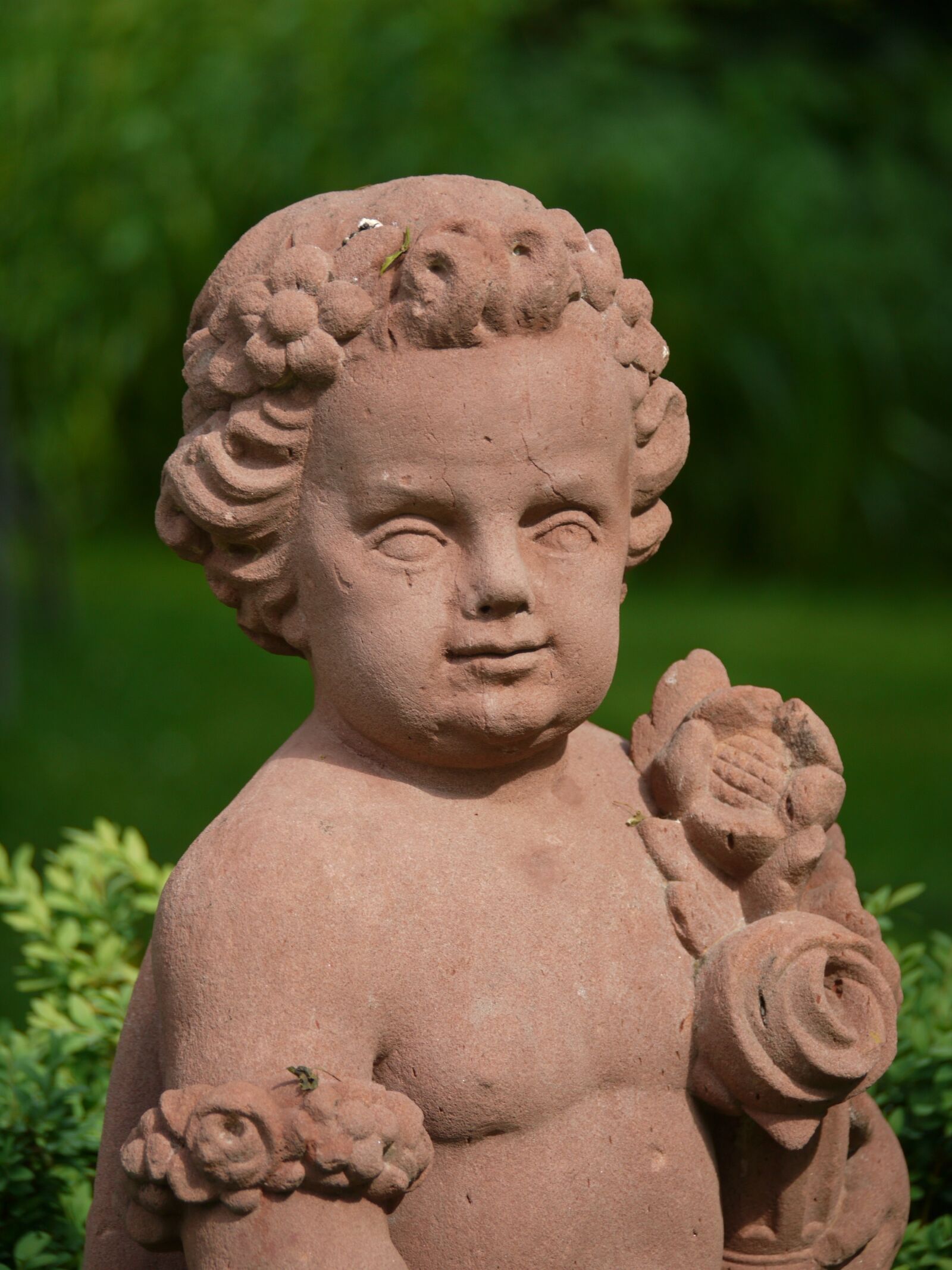 Panasonic Lumix DMC-G1 sample photo. Stone, sculpture, cherub photography