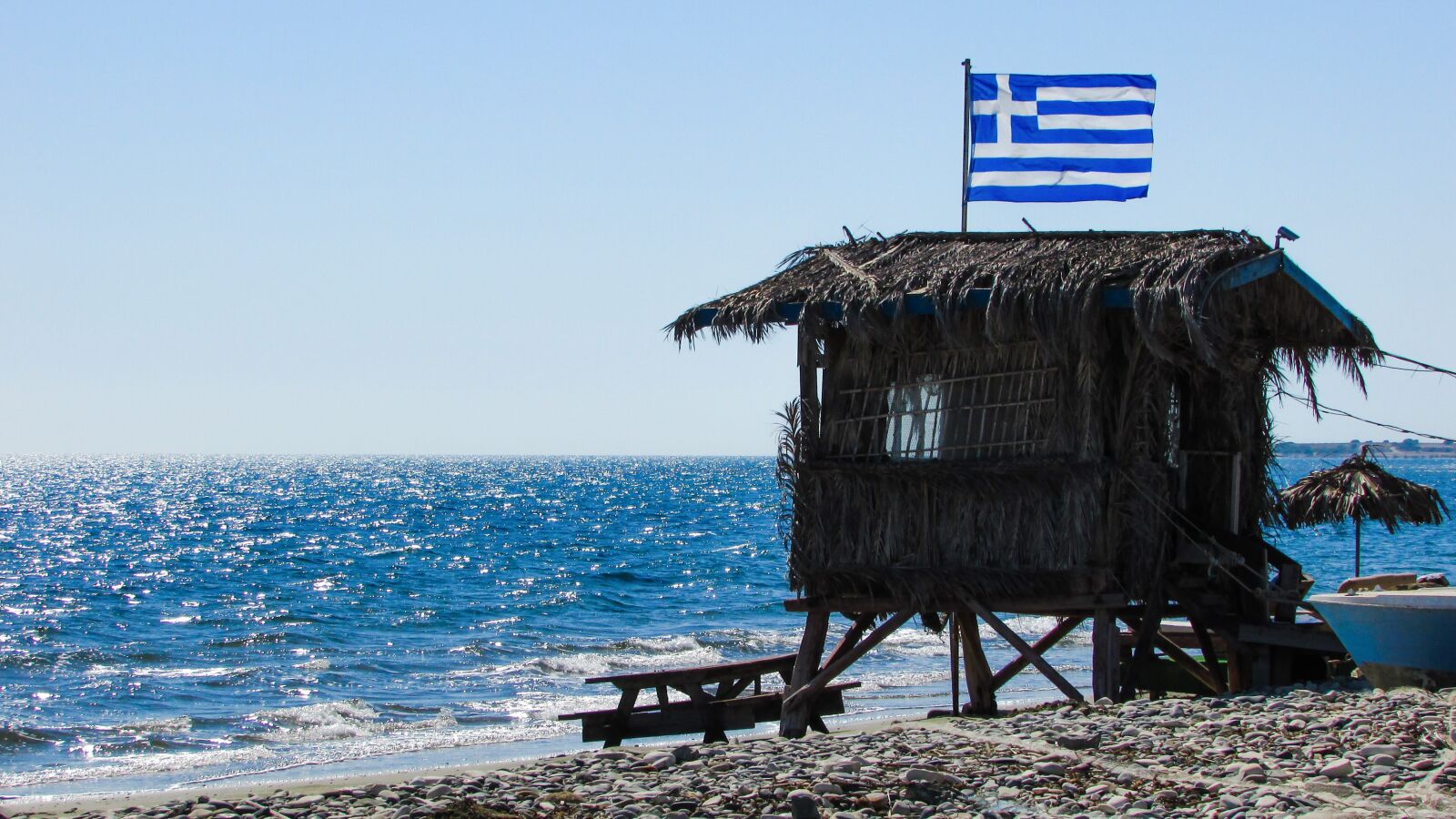 Canon PowerShot SX400 IS sample photo. Hut, rough, beach photography