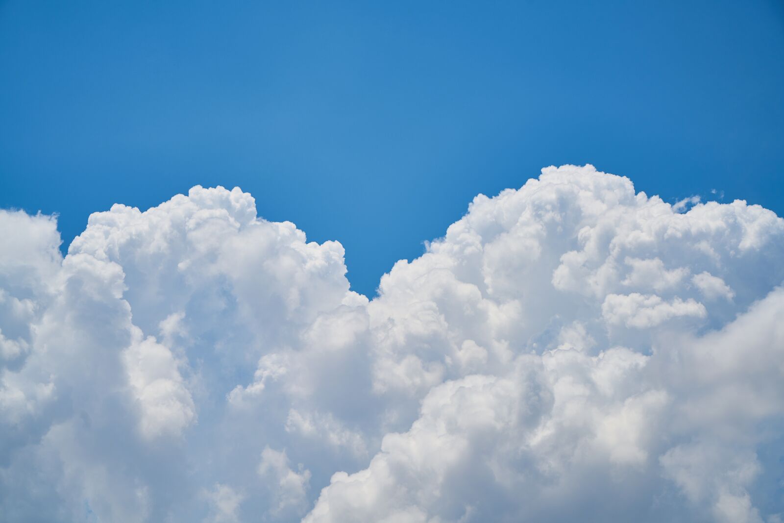 Sony a7R II sample photo. Blue, clouds, white photography