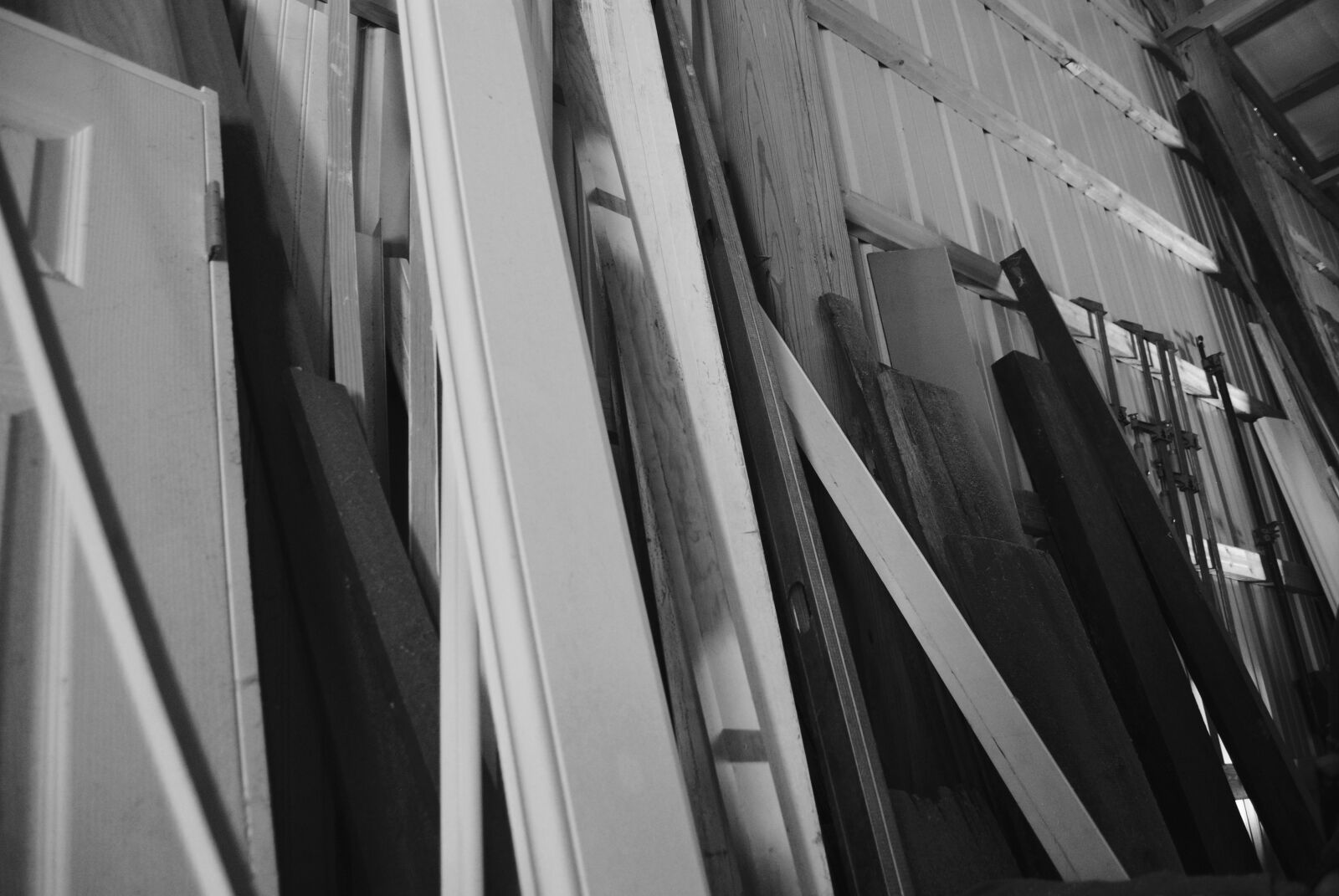 Nikon D3000 sample photo. Door, pile, supplies, wood photography
