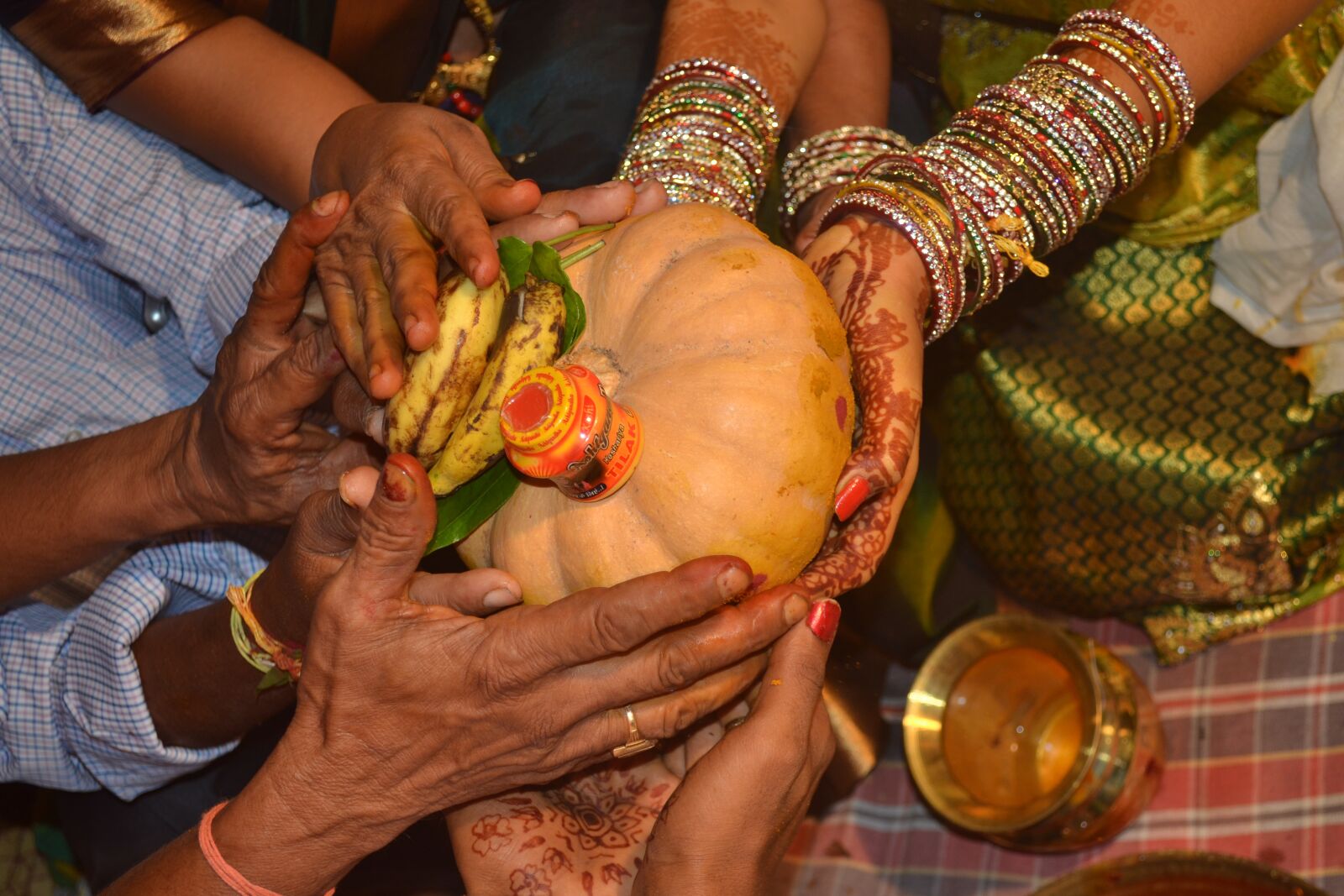 Nikon D3100 sample photo. Indian, wedding, pumpkin donating photography