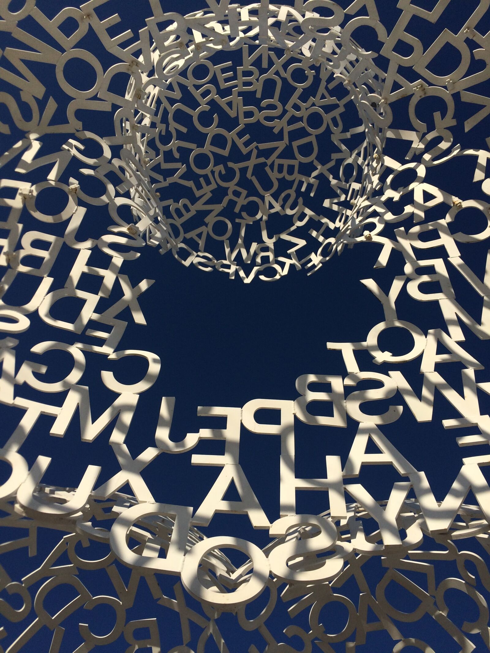 iPhone 5s back camera 4.15mm f/2.2 sample photo. Letters, sculpture, sky photography