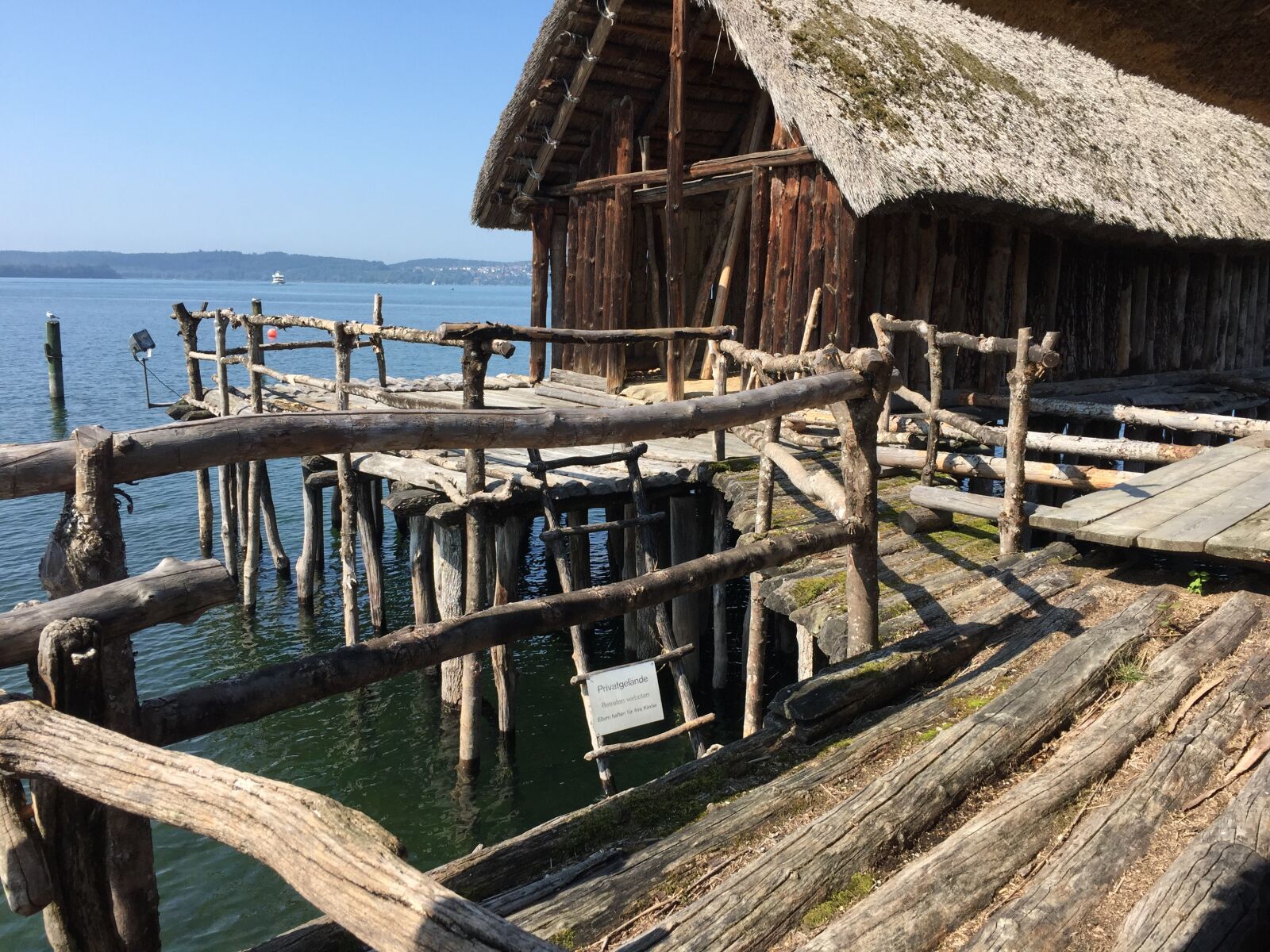 iPhone 6 back camera 4.15mm f/2.2 sample photo. Stilt houses, lake constance photography