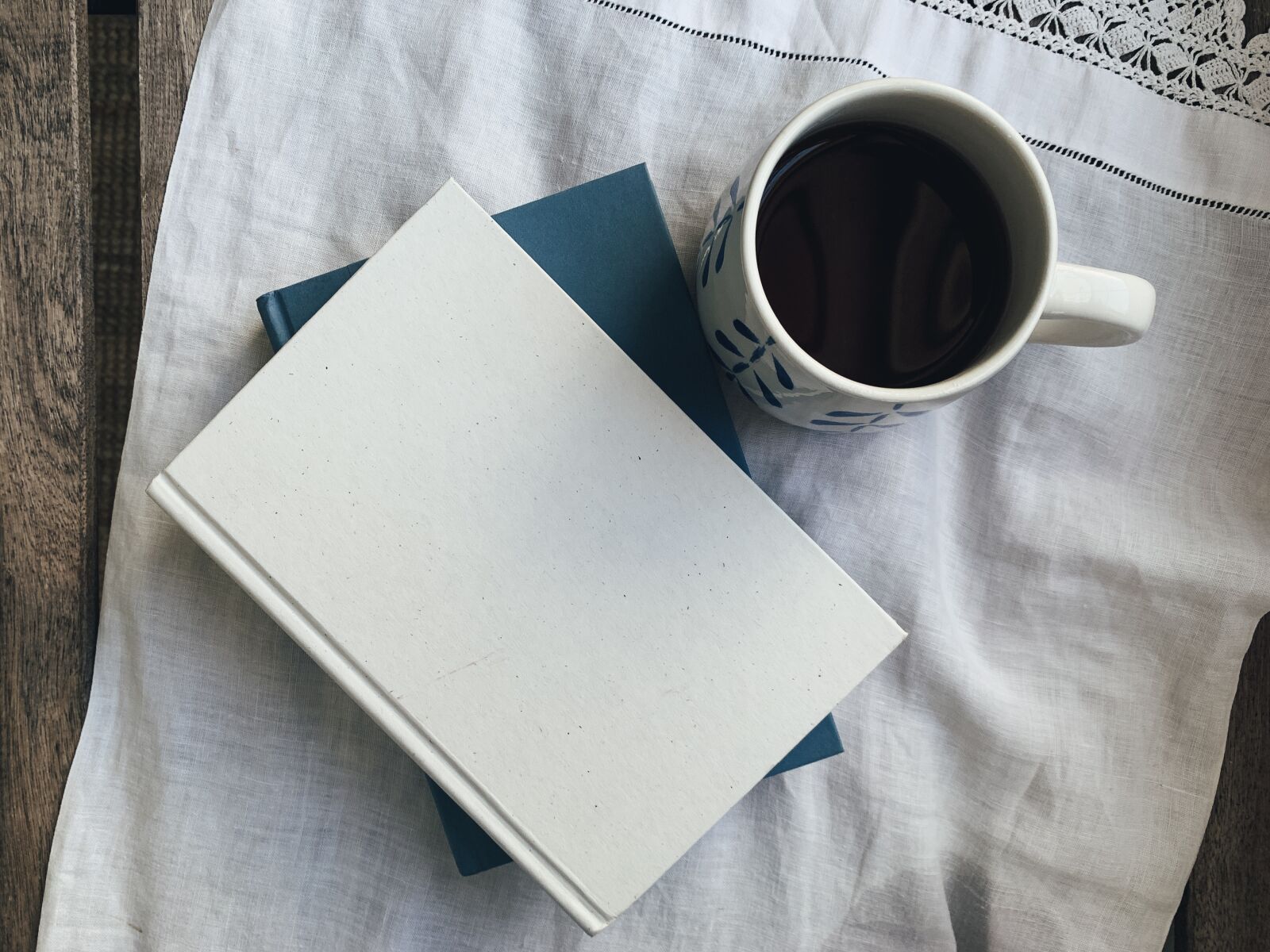 Apple iPhone XR sample photo. Books, beverage, table photography