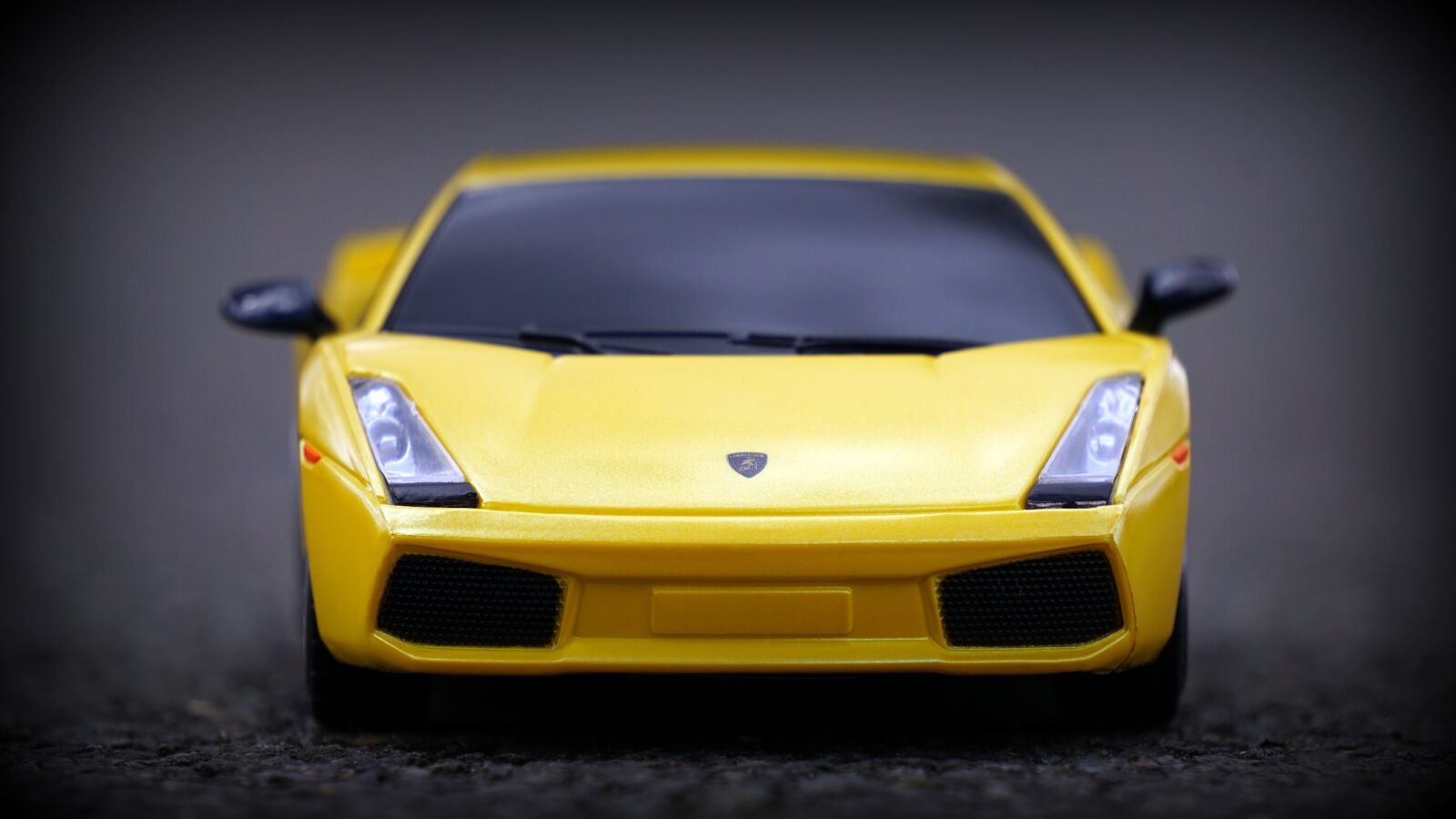 Sony E 55-210mm F4.5-6.3 OSS sample photo. Car, headlights, lamborghini photography