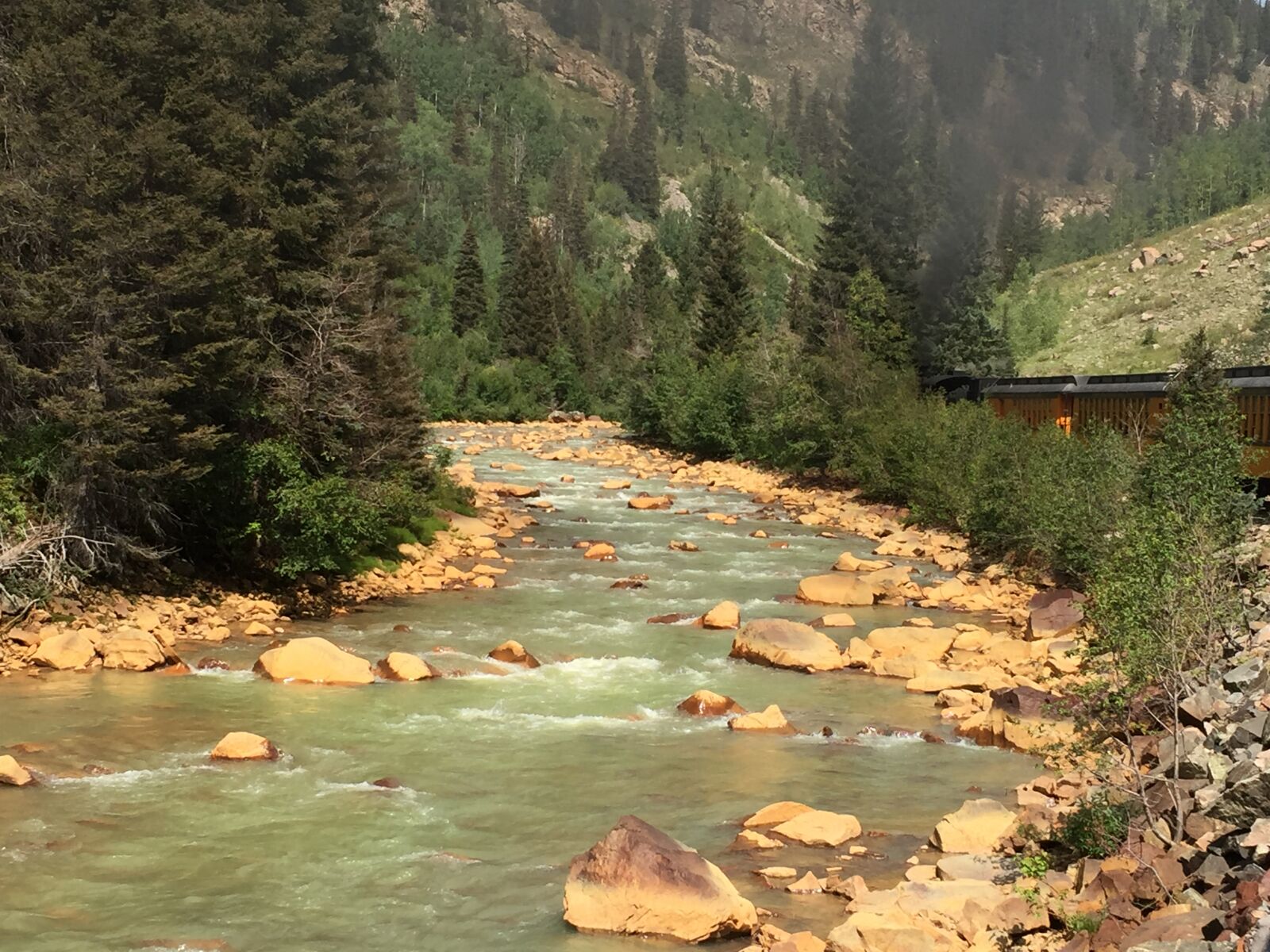iPhone 6 back camera 4.15mm f/2.2 sample photo. Mountains, river, train photography