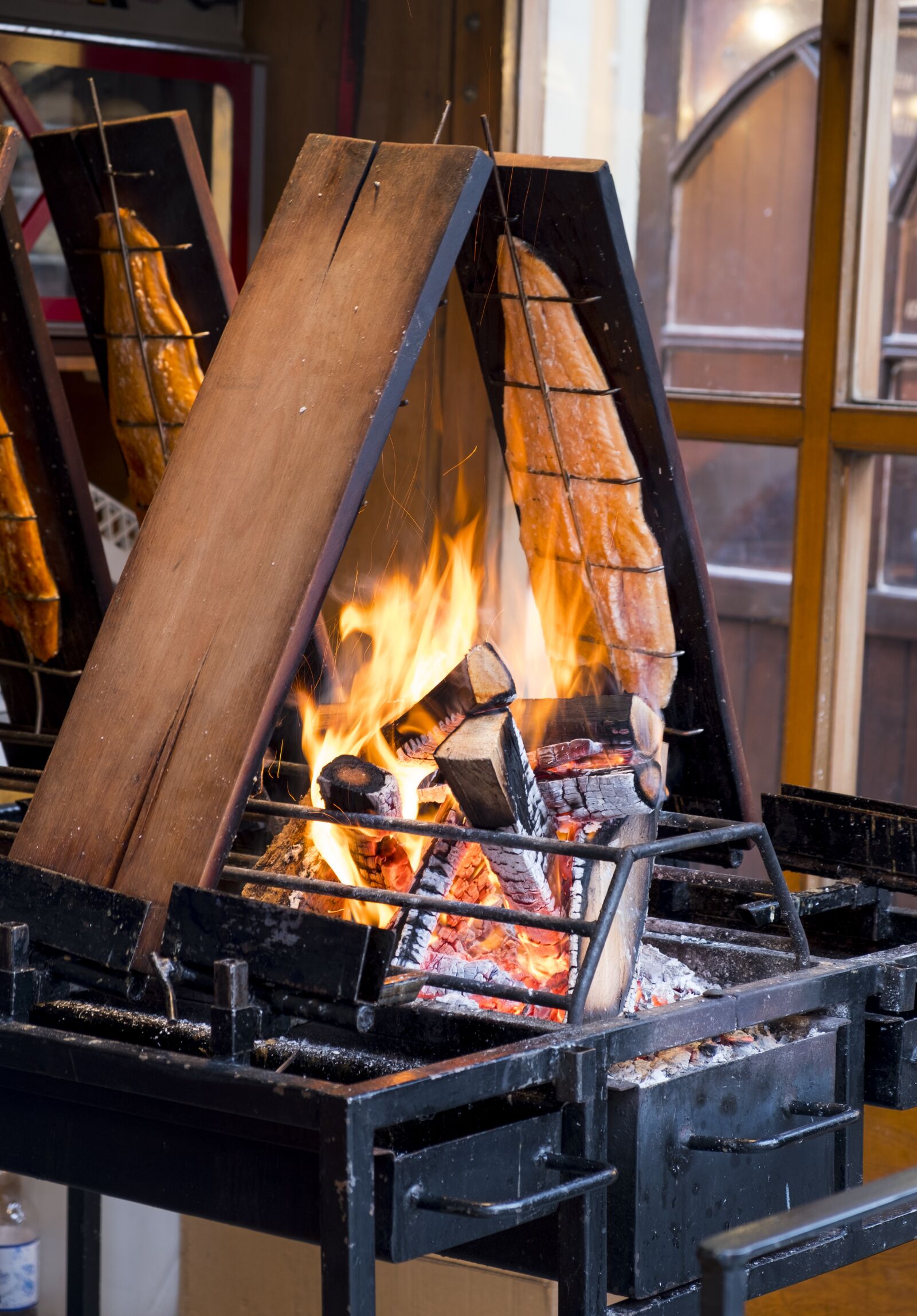Fujifilm XF 18-55mm F2.8-4 R LM OIS sample photo. Fire, smoking, fish photography