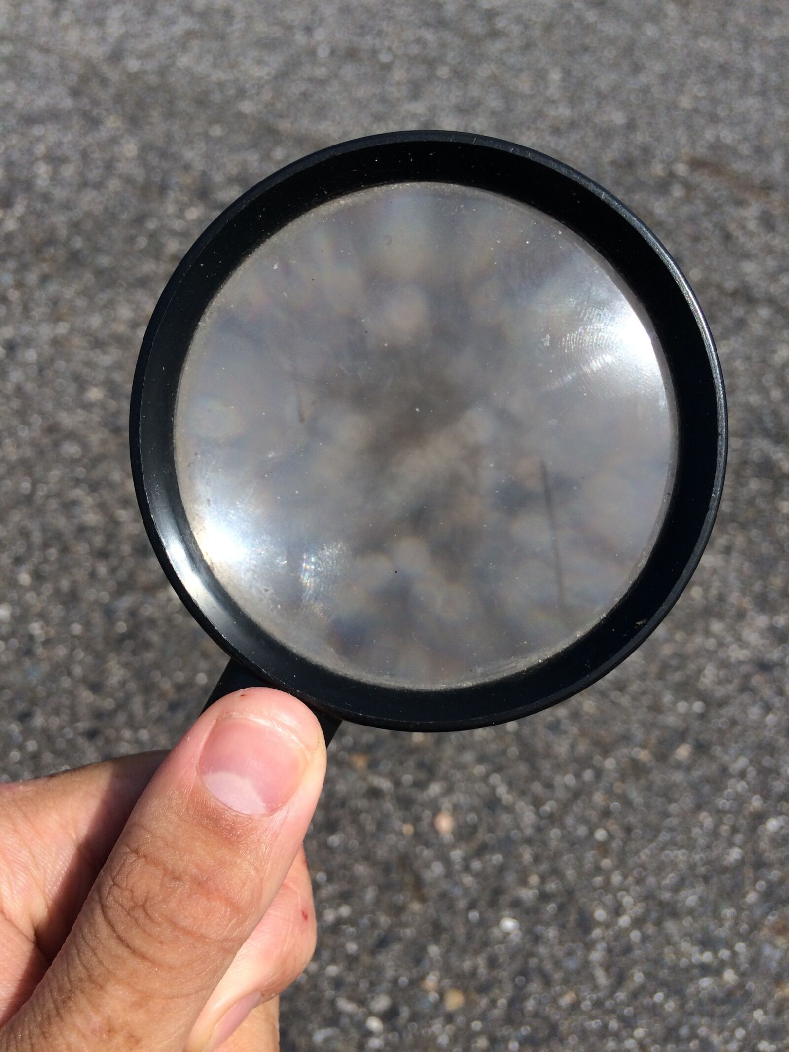 Apple iPhone 5s sample photo. Hand, magnifying glass, discovery photography