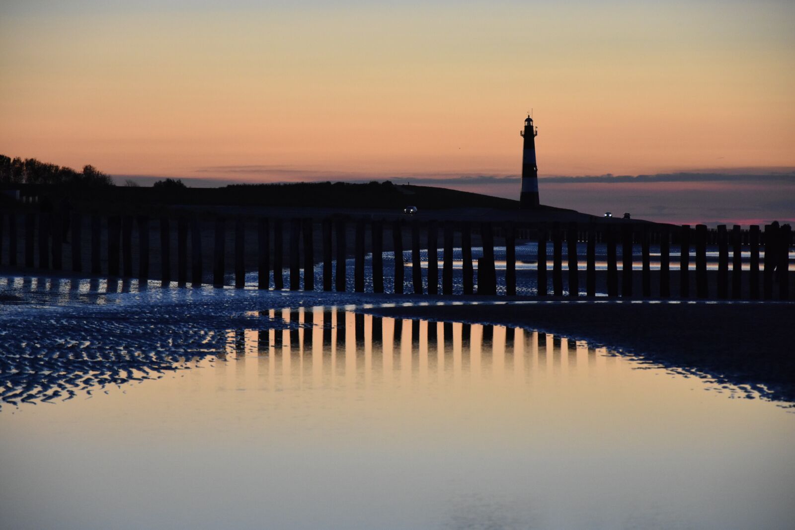 Nikon D3400 sample photo. Evening sun, lighthouse, mirroring photography