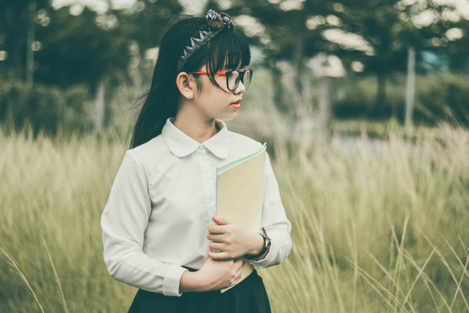 Canon EOS 60D + Canon EF 50mm F1.8 II sample photo. Asian, blur, book, child photography