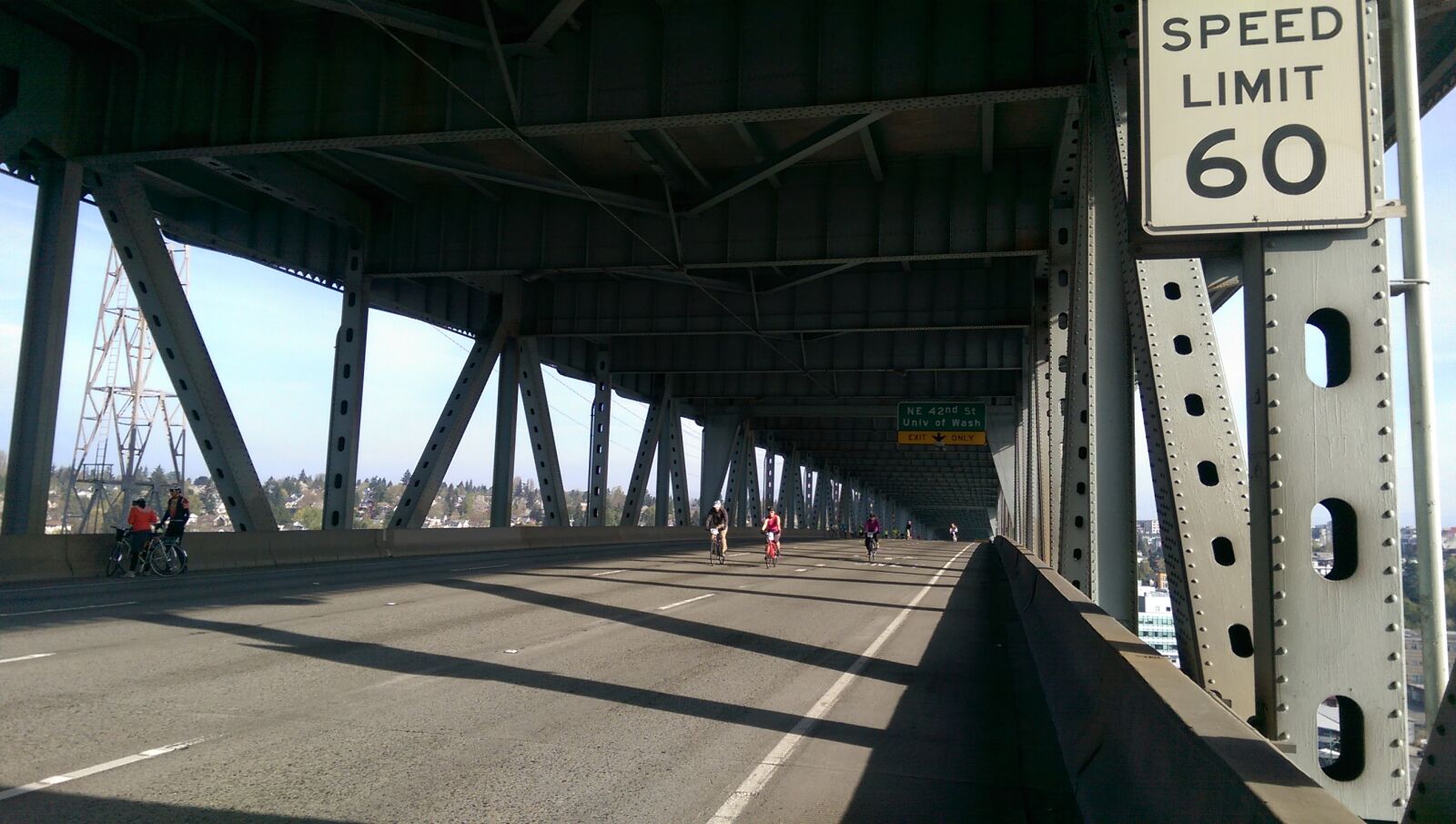 HTC ONE M8 sample photo. Bicycles, bicyclists, bridge, emerald photography