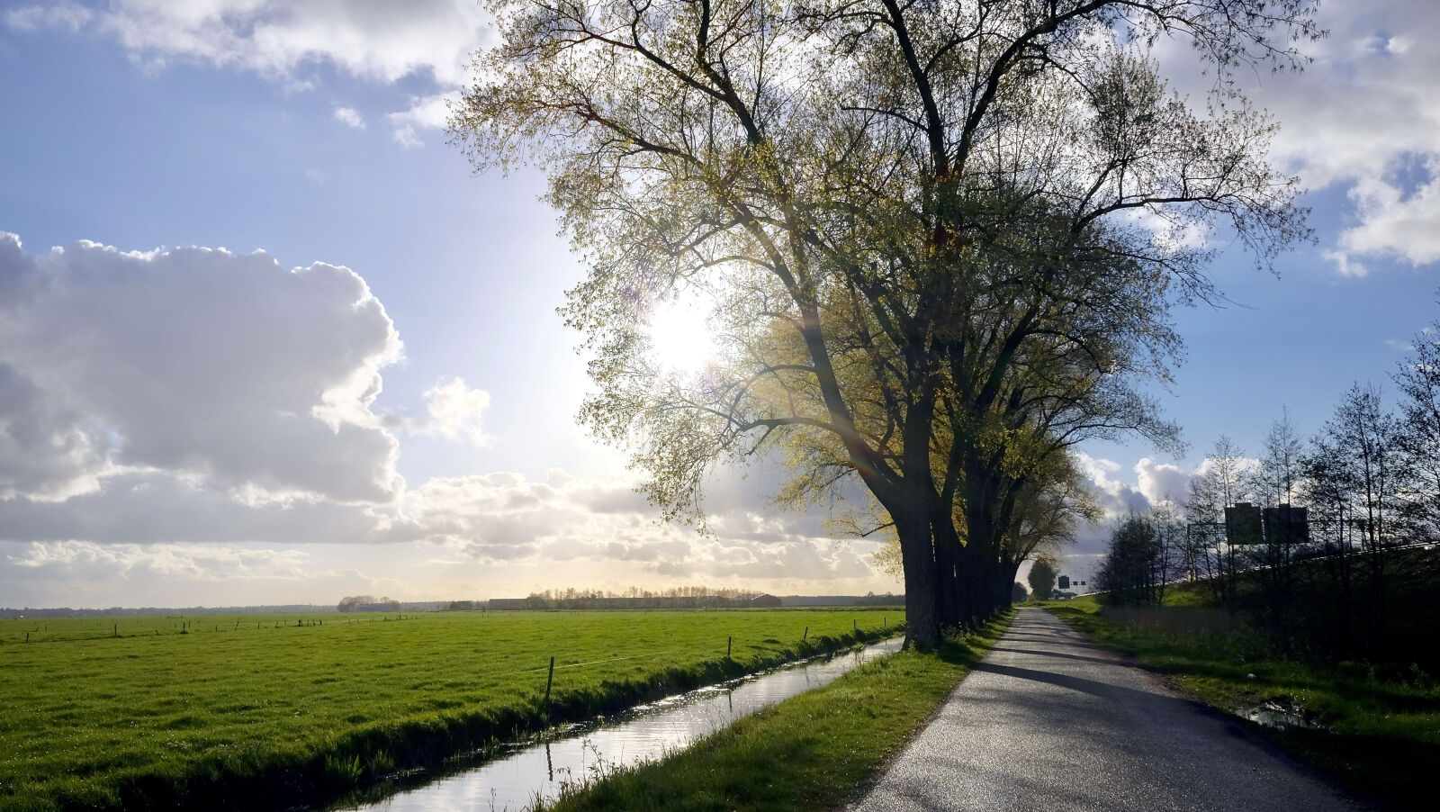 Fujifilm X70 sample photo. Clouds, countryside, daylight, environment photography