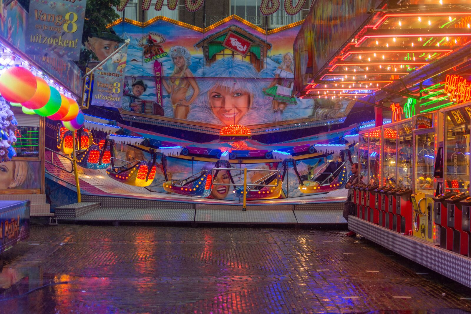 Nikon D7200 sample photo. Funfair, rain, light photography