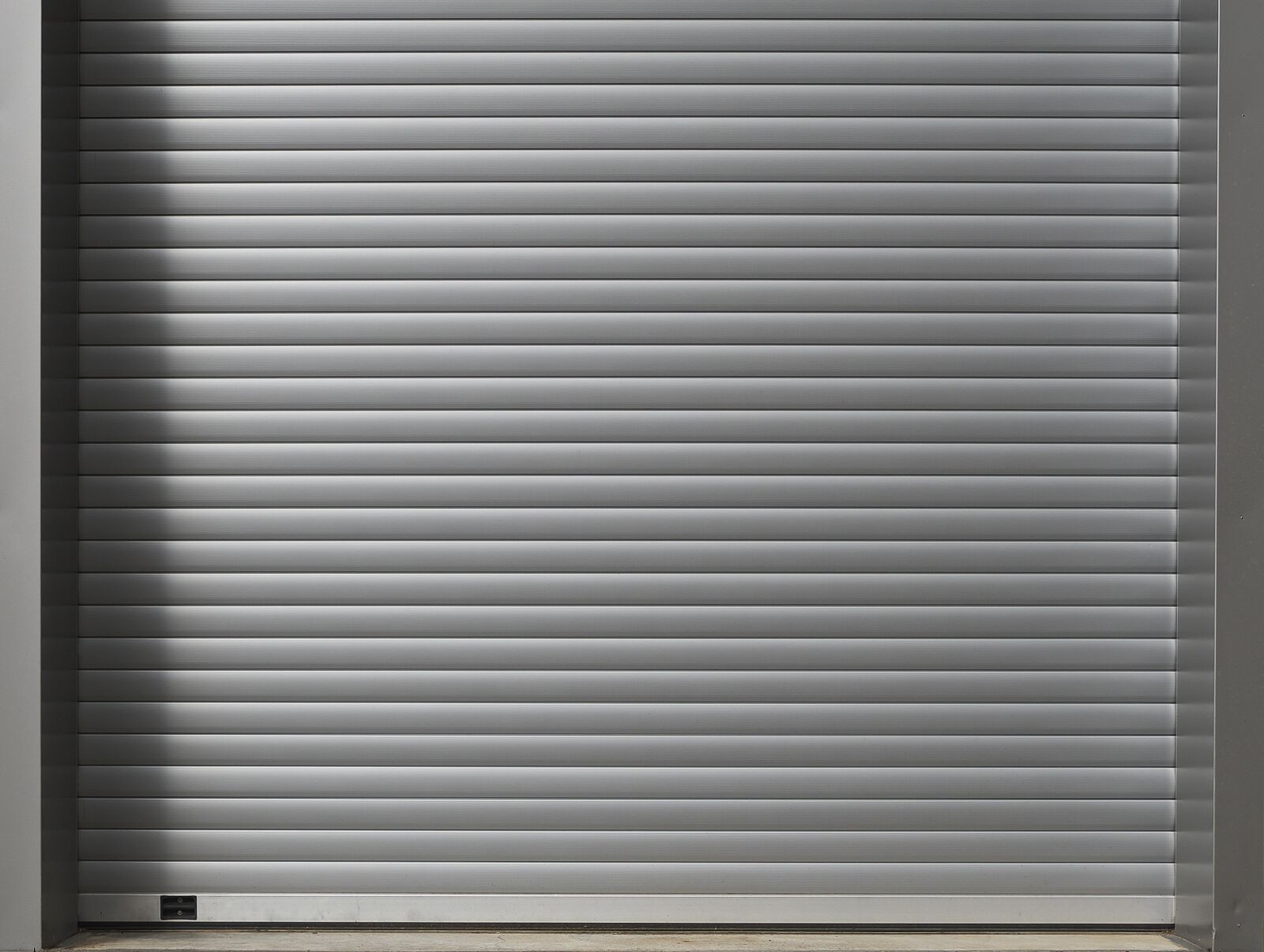 Panasonic Lumix DMC-FZ1000 sample photo. Roll up door, garage photography