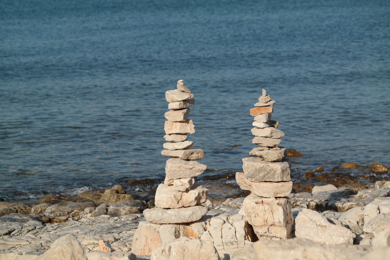Samsung NX30 + NX 50-200mm F4-5.6 sample photo. Stone towers, sea, beach photography