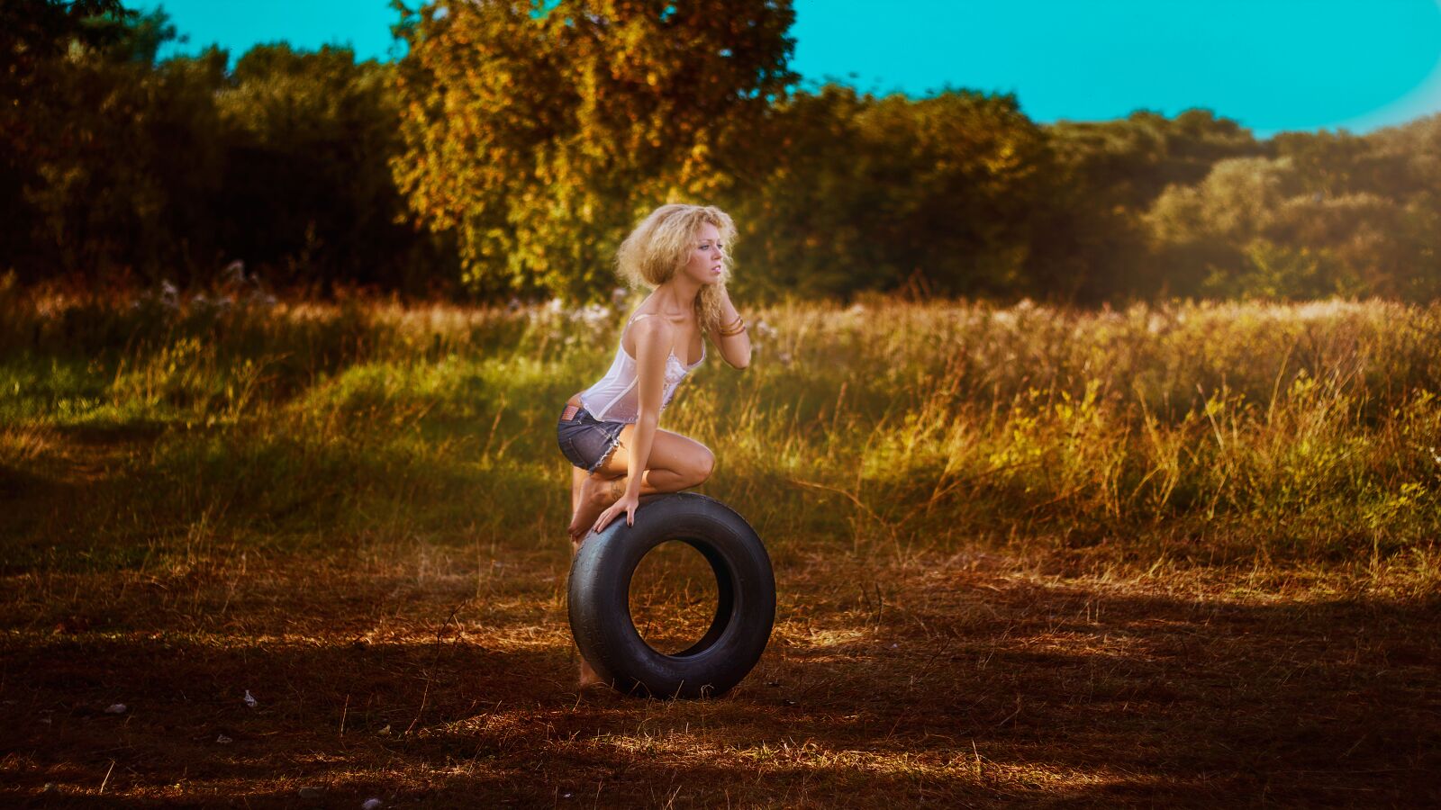 Canon EOS 60D sample photo. Girl with a wheel photography