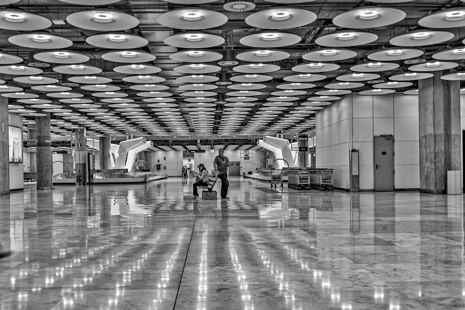 Canon EF 24-70mm F4L IS USM sample photo. Madrid, airport, people photography