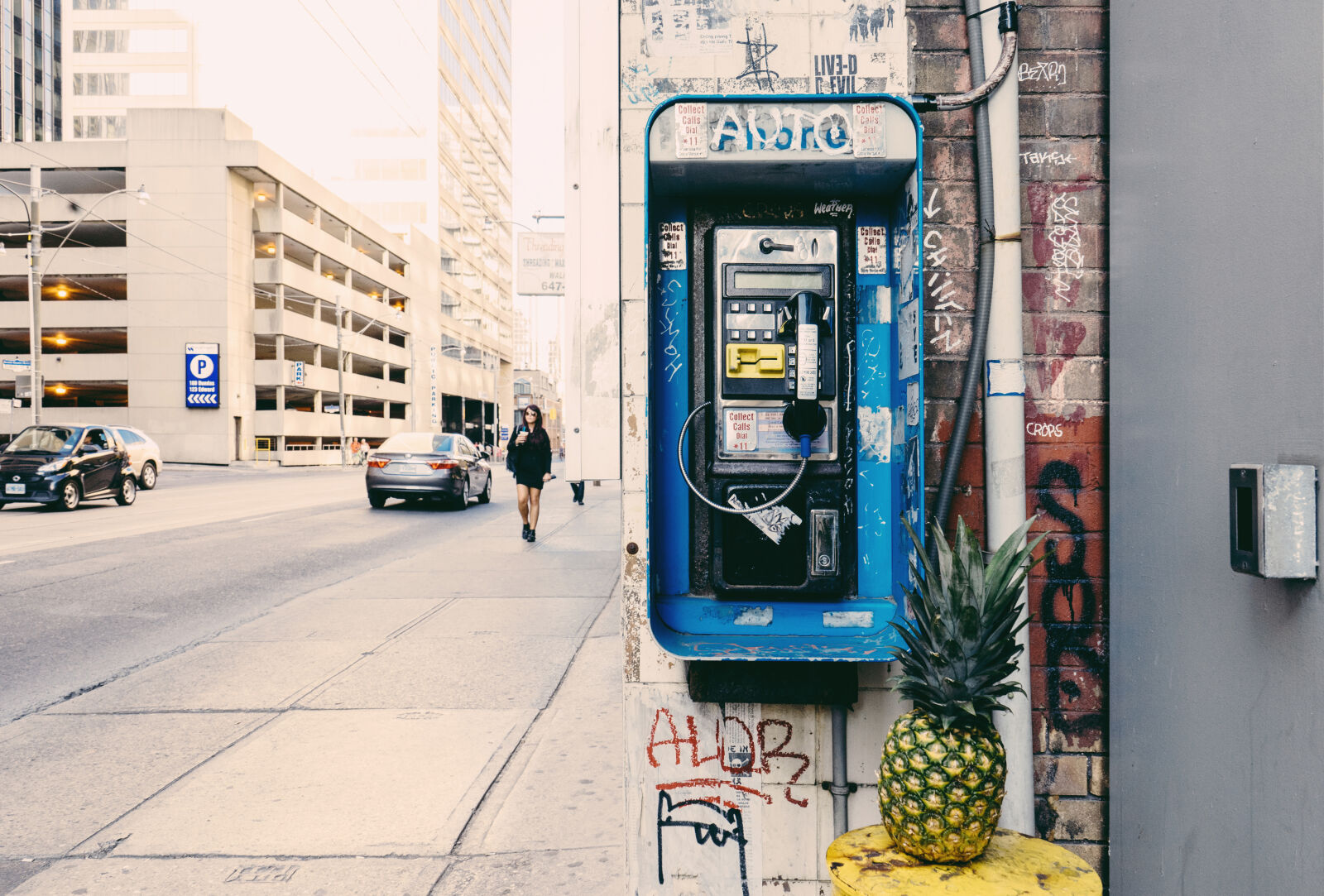 Sony a7 II + Sony FE 28-70mm F3.5-5.6 OSS sample photo. Buildings, cars, fruit, graffiti photography