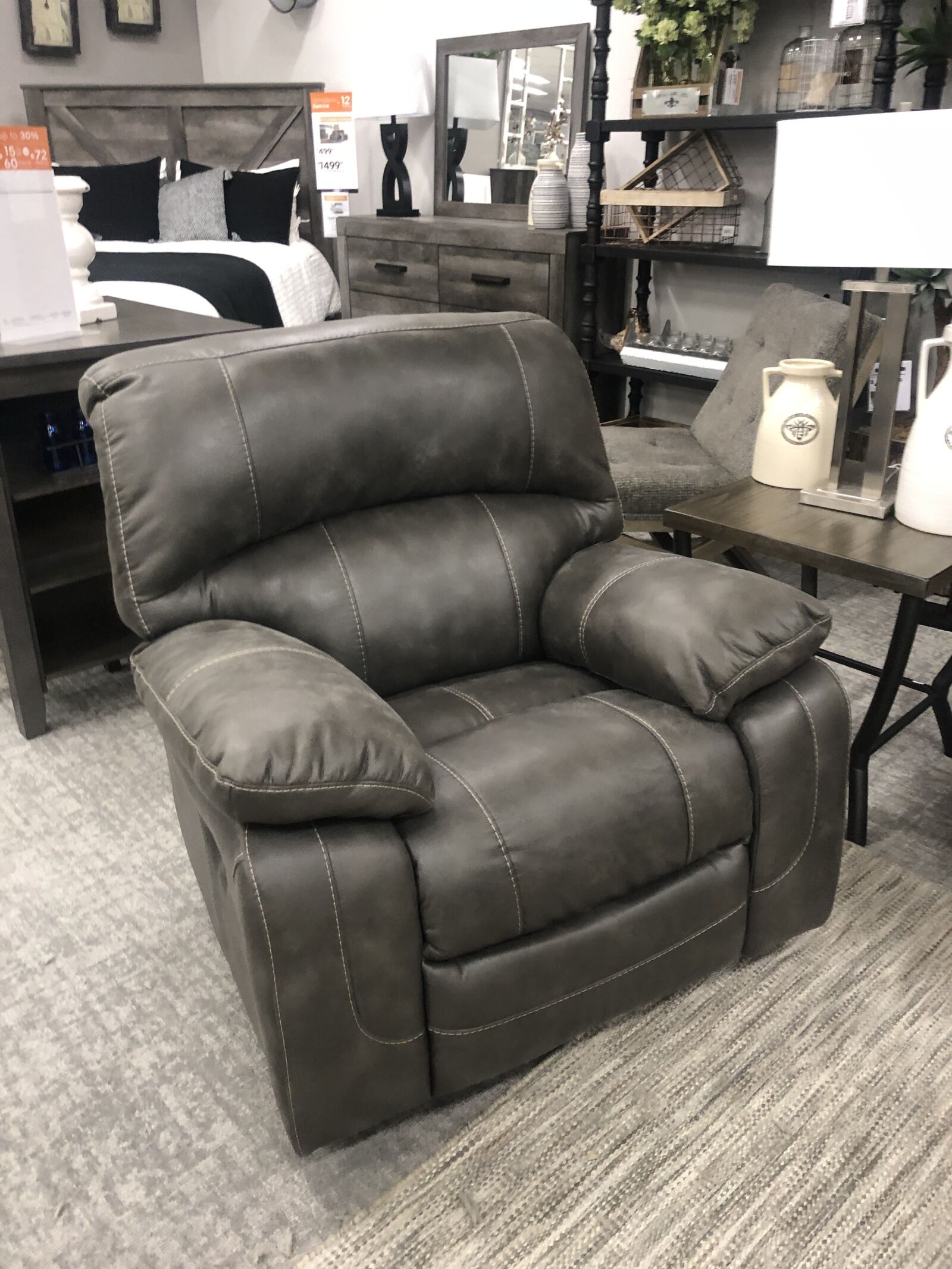 iPhone X back dual camera 4mm f/1.8 sample photo. Recliner, furniture store, home photography