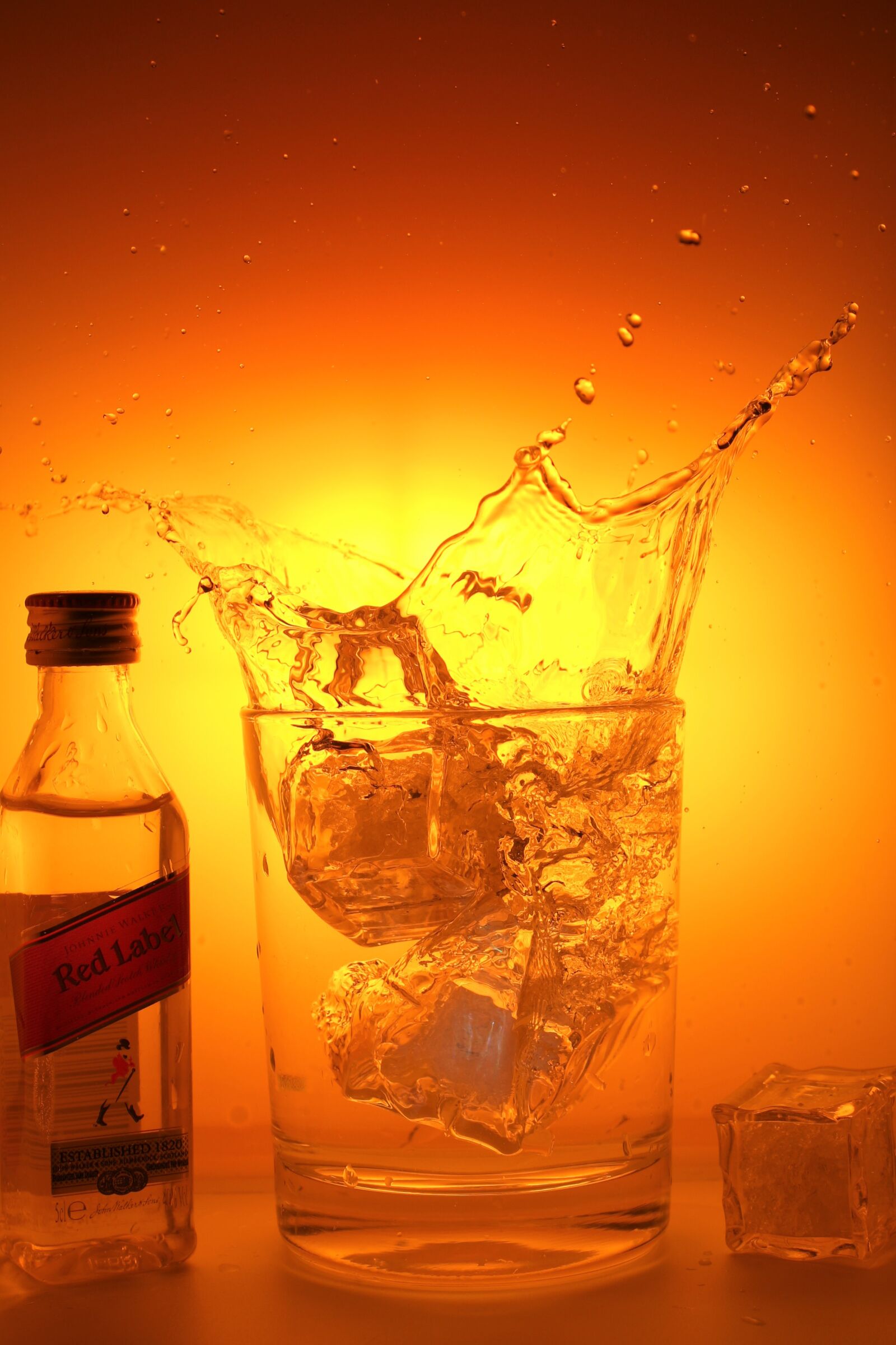 Canon EF-S 18-55mm F3.5-5.6 IS sample photo. Water, ice cubes, drink photography