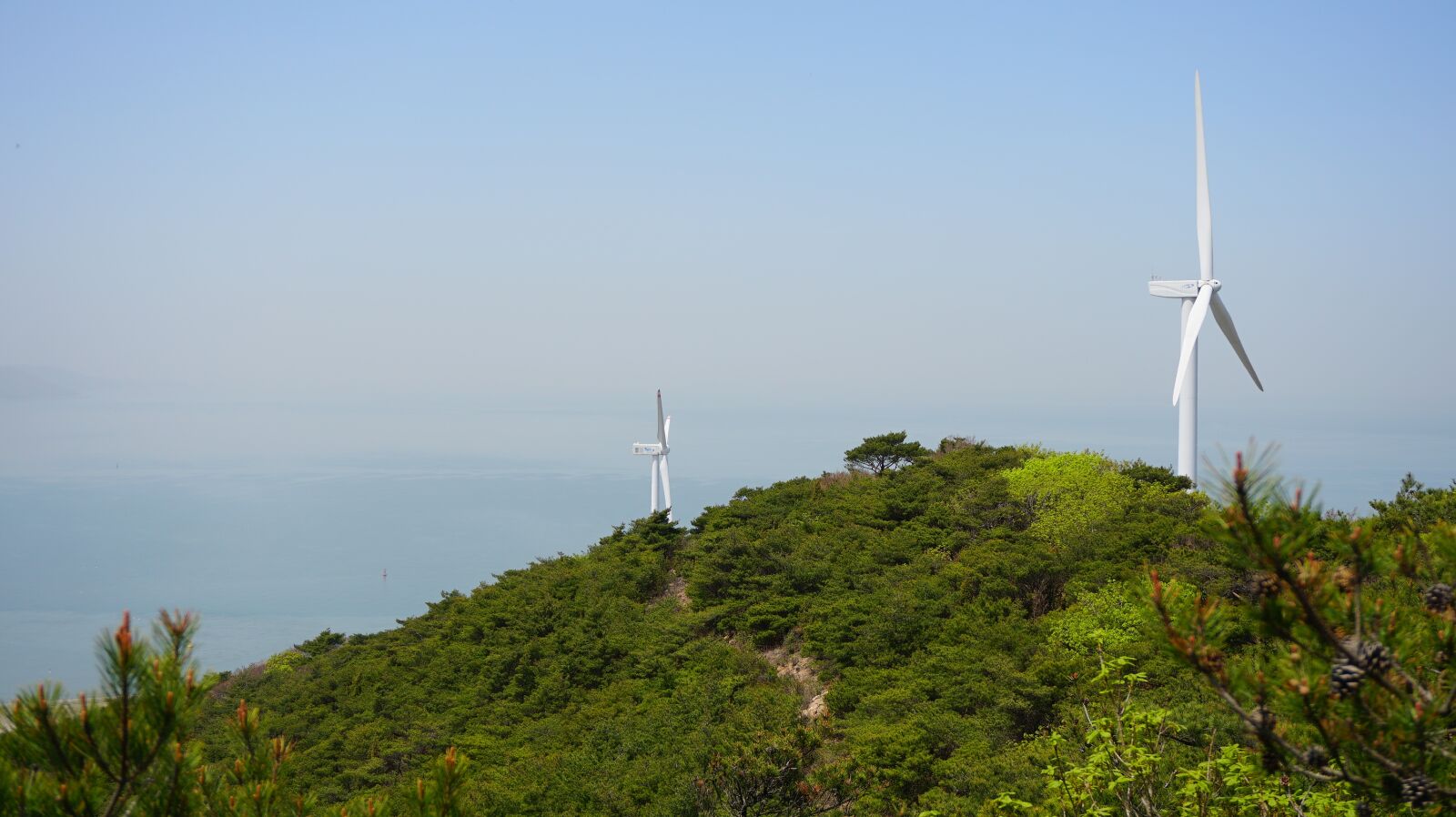 Sony a6300 sample photo. Windmill, mountain, sea photography