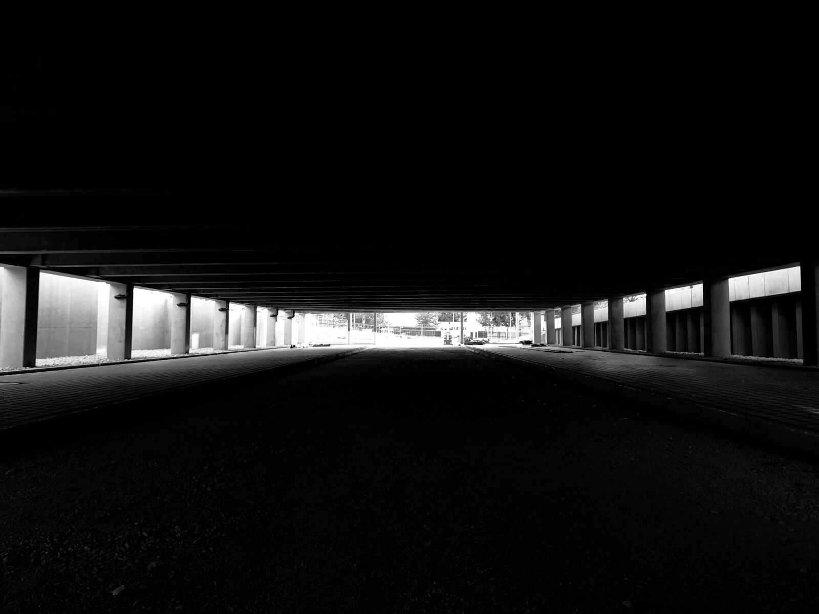 iPhone X back dual camera 4mm f/1.8 sample photo. Black-and-white, garage, perspective photography