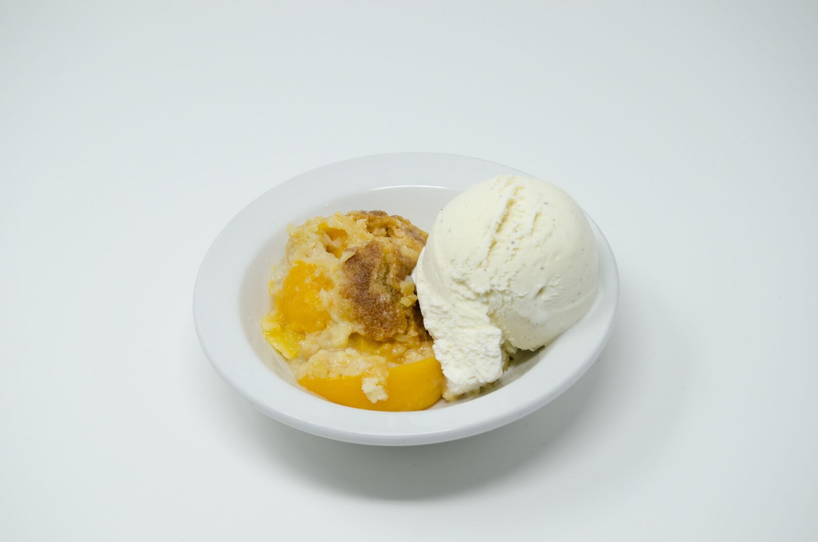 Nikon D7000 sample photo. Peach cobbler, peach, dessert photography