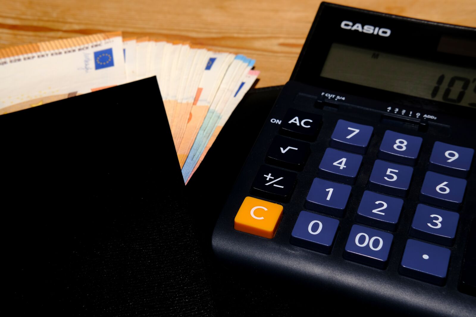 Fujifilm X-T2 + Fujifilm XF 35mm F2 R WR sample photo. Desktop computer, calculator, accounting photography