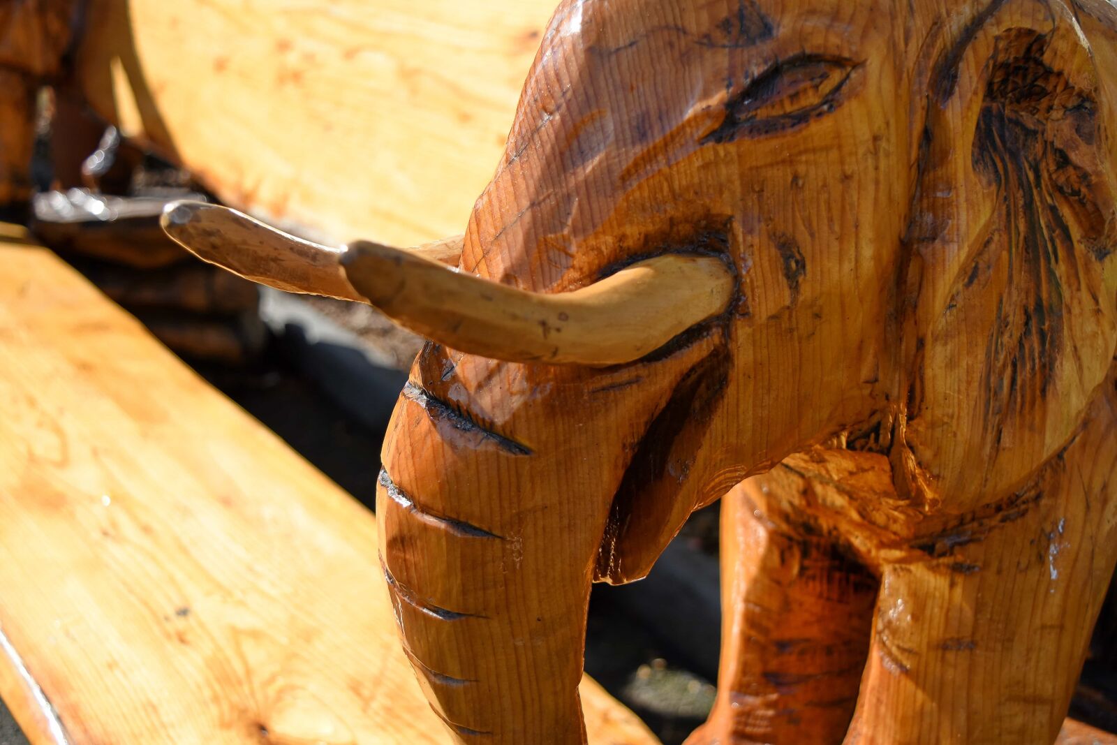 Nikon D5500 sample photo. Bench, carving, elephant, furniture photography