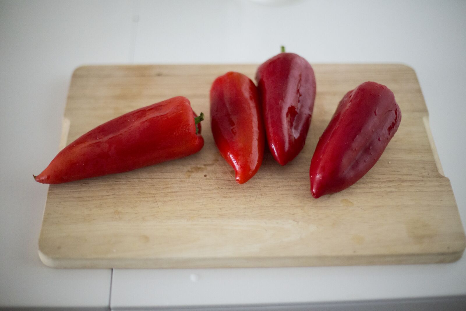 Canon EOS 6D + Canon EF 50mm F1.4 USM sample photo. Food, red, cooking, bell photography