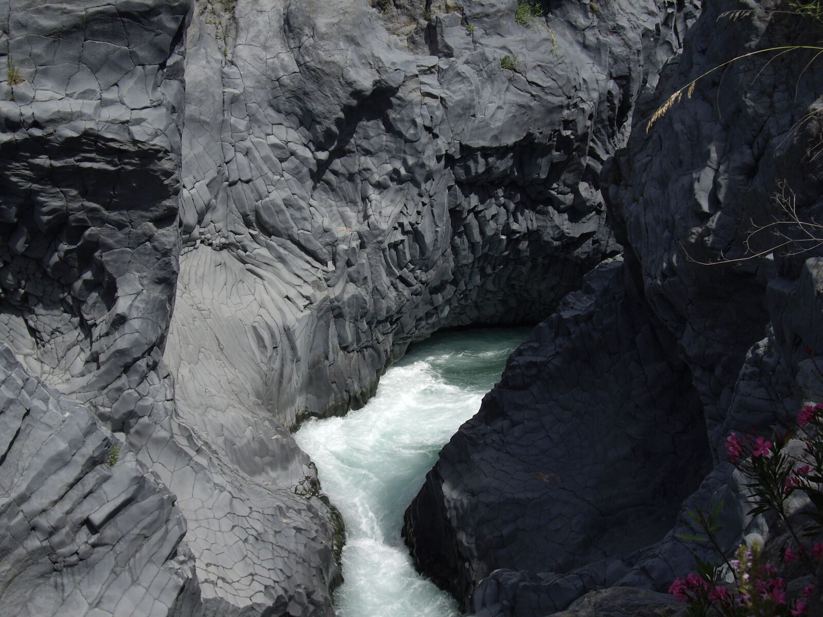 Pentax OPTIO A10 sample photo. Volcanic rock, river, nature photography