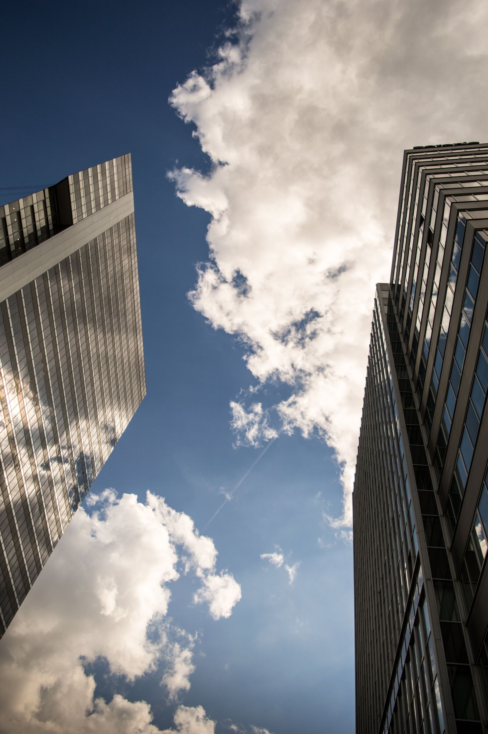 Nikon D3200 sample photo. Cloud, buildings, minimalist photography