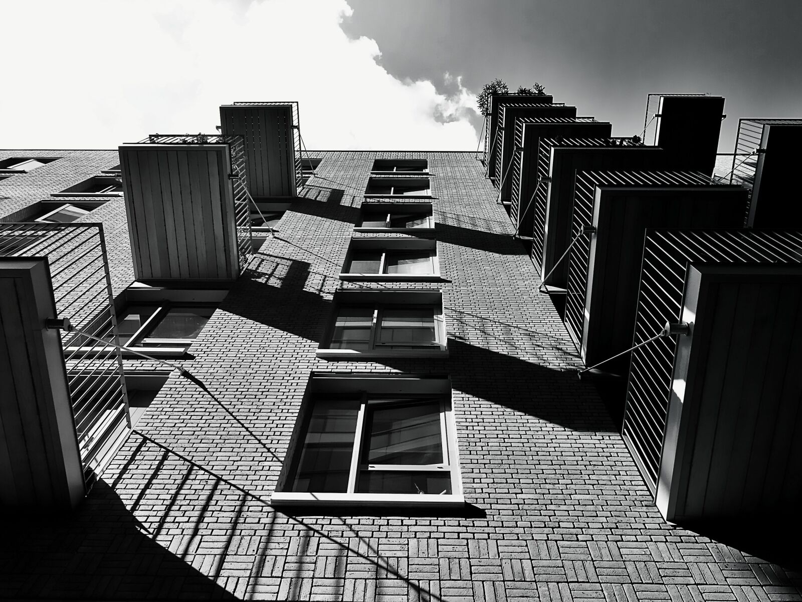 Sony DSC-HX60 sample photo. Apartment, architecture, balconies, black photography