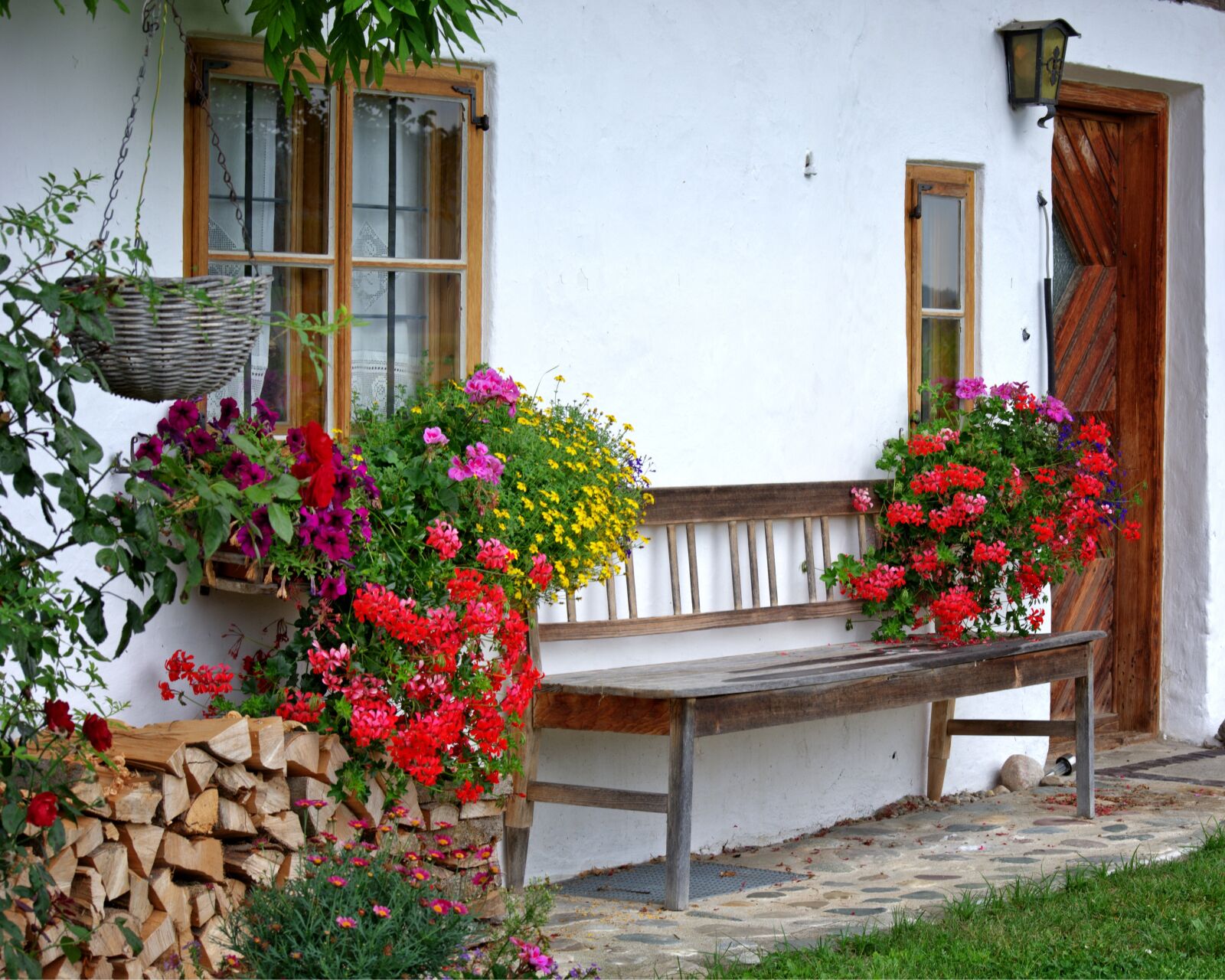 55.0-200.0mm f/4.0-f/5.6 sample photo. Bench, house, facade photography