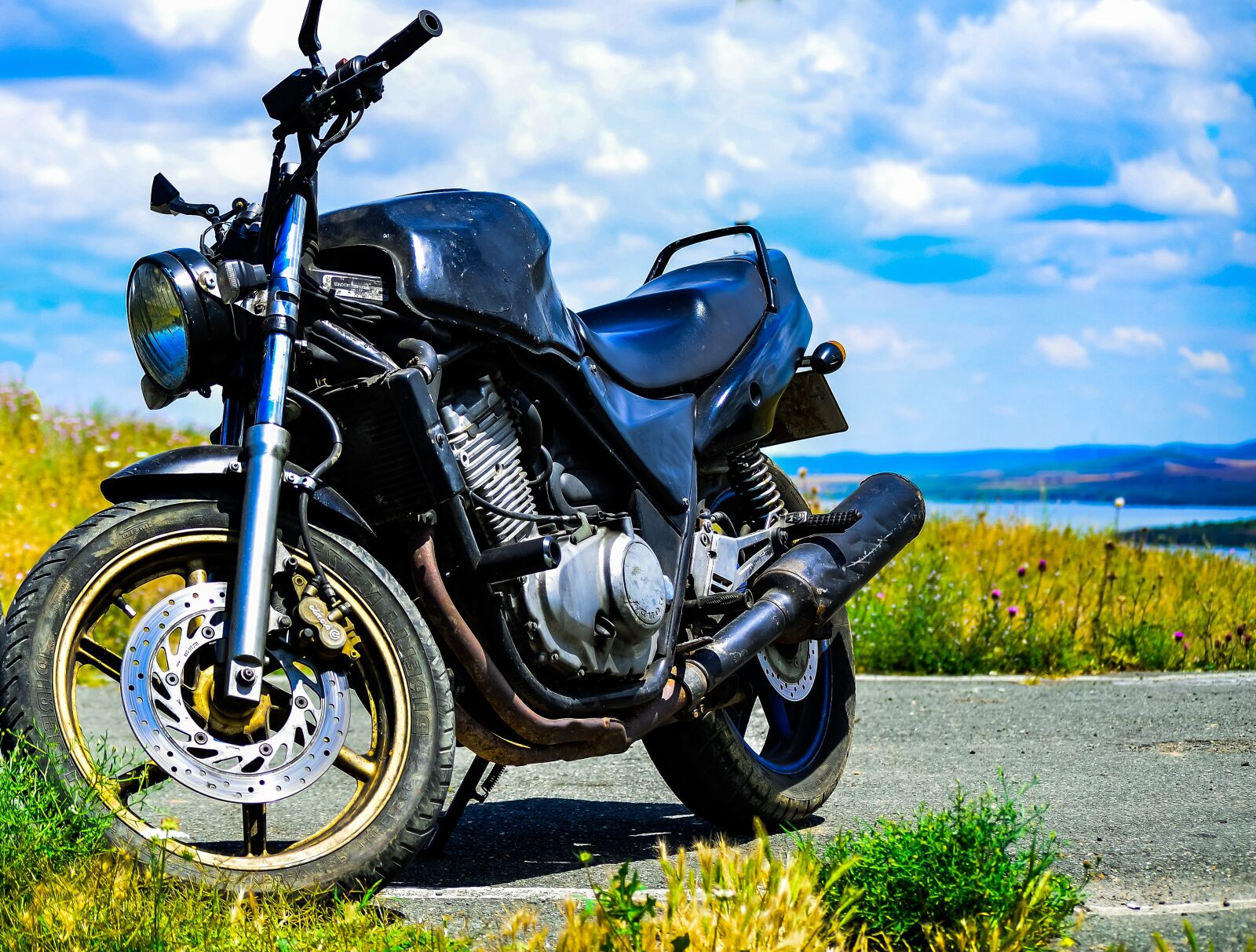 Nikon D7000 sample photo. Motorcycle, clouds, sky photography