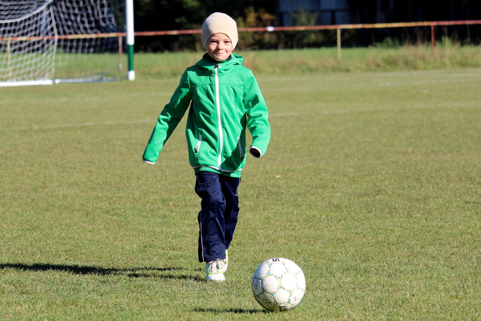 Canon EF-S 55-250mm F4-5.6 IS STM sample photo. Football, child, smile photography