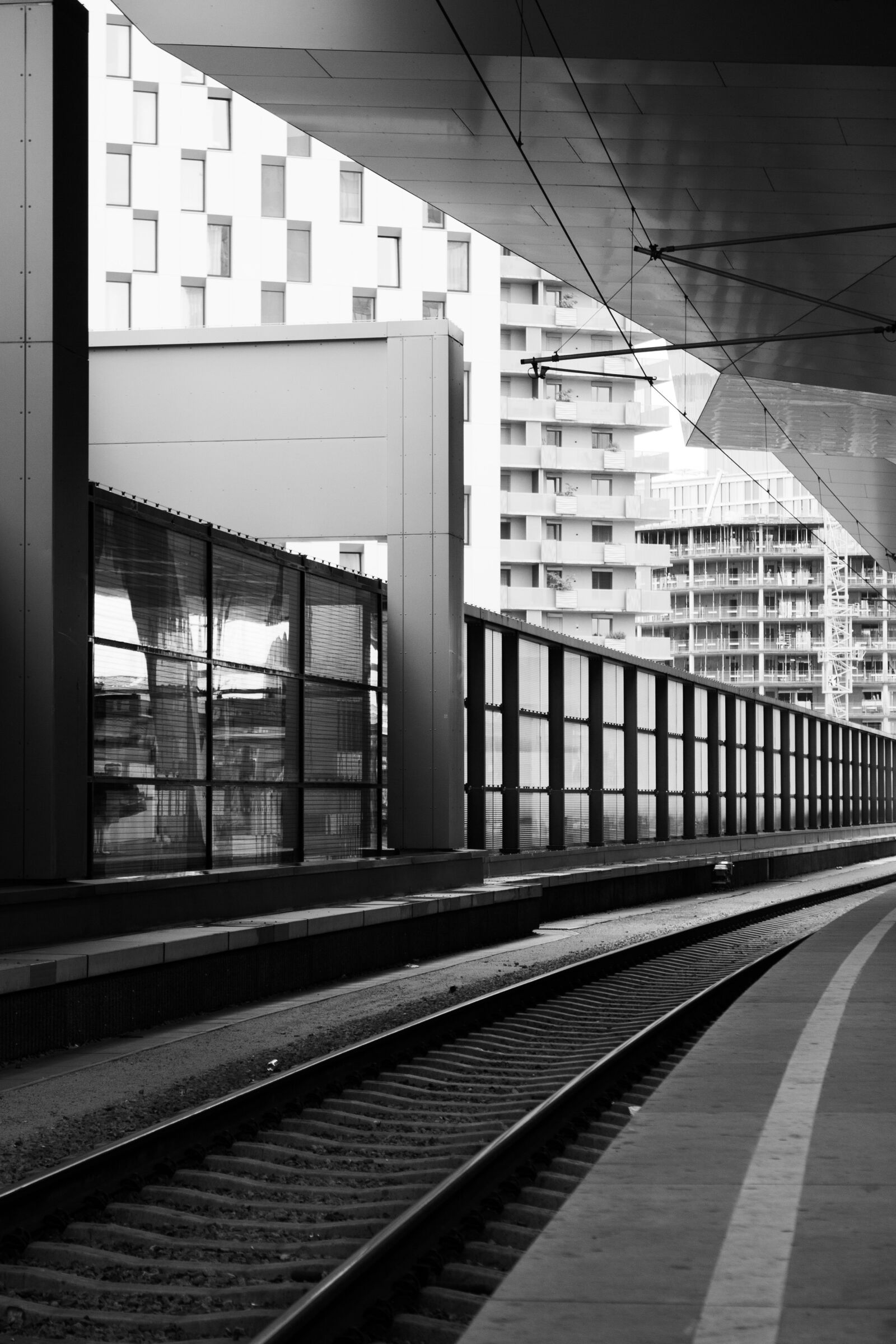 Canon EF-S 18-55mm F3.5-5.6 IS sample photo. Rails, train, central station photography