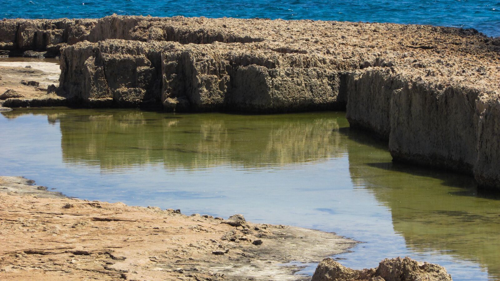 Canon PowerShot SX400 IS sample photo. Rocky coast, formations, water photography