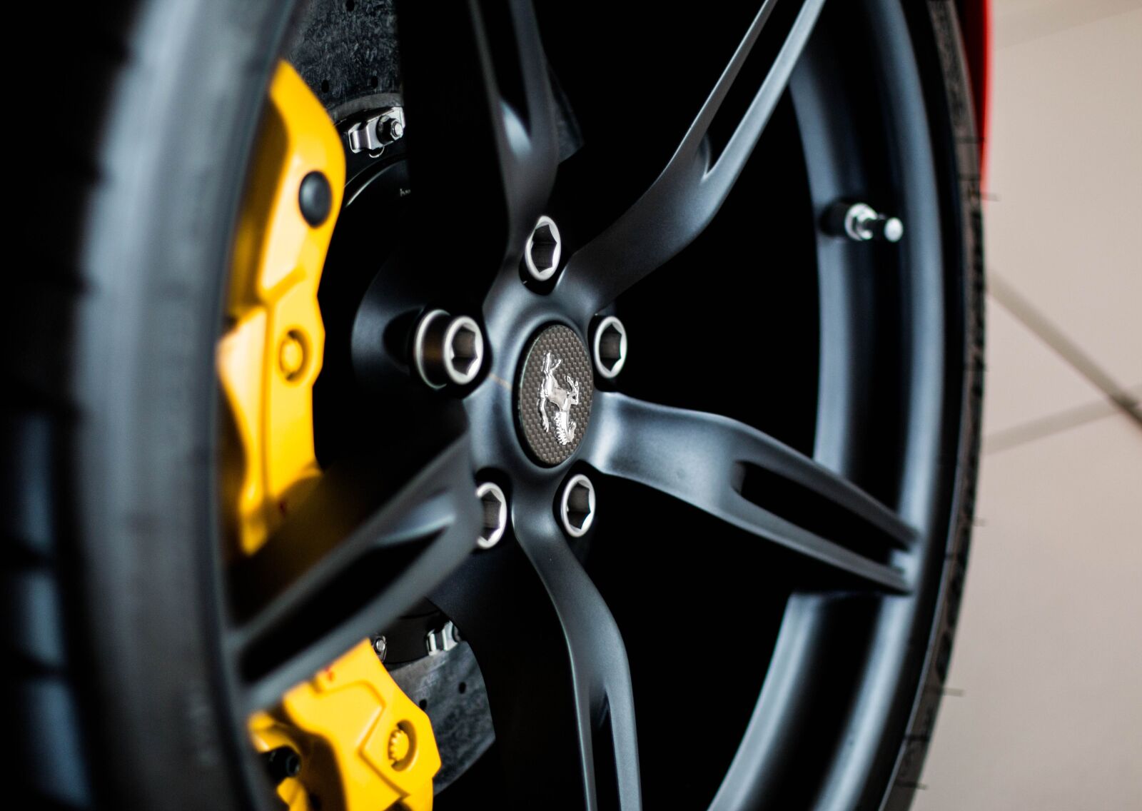Canon EOS 70D + Canon EF 50mm F1.4 USM sample photo. Ferrari, wheel, design photography