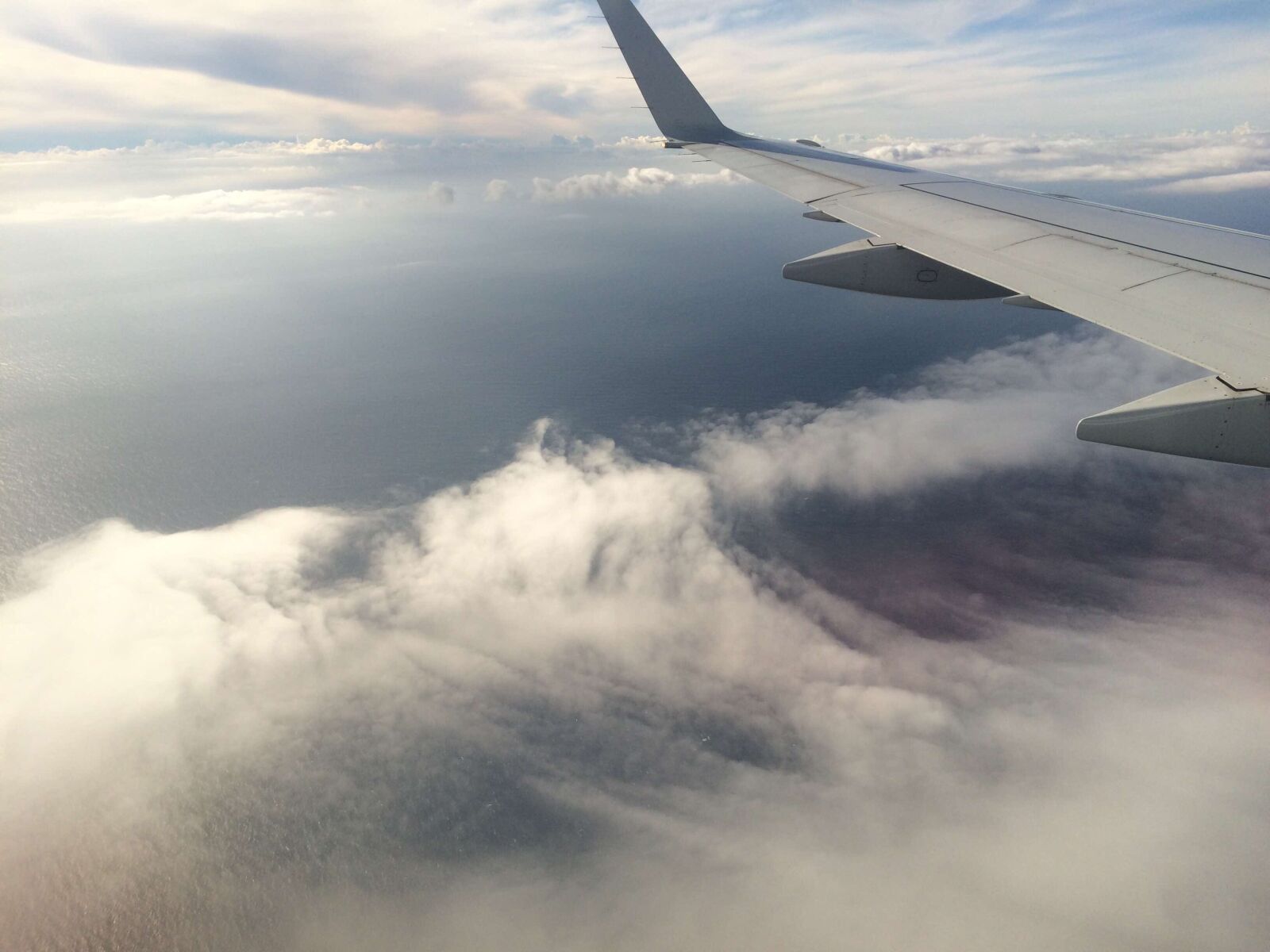 iPhone 5s back camera 4.15mm f/2.2 sample photo. Airplane, clouds, sky photography