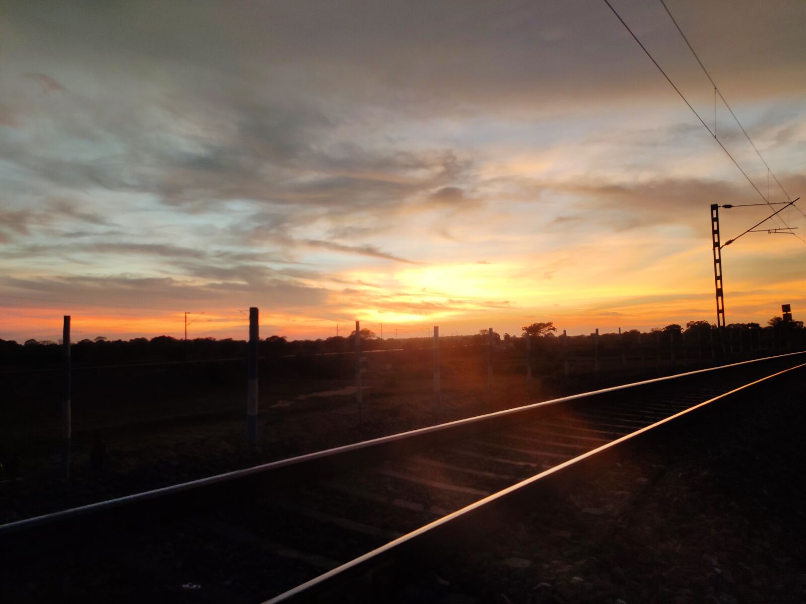 Xiaomi Redmi Note 7 Pro sample photo. Sunset, with rail line photography